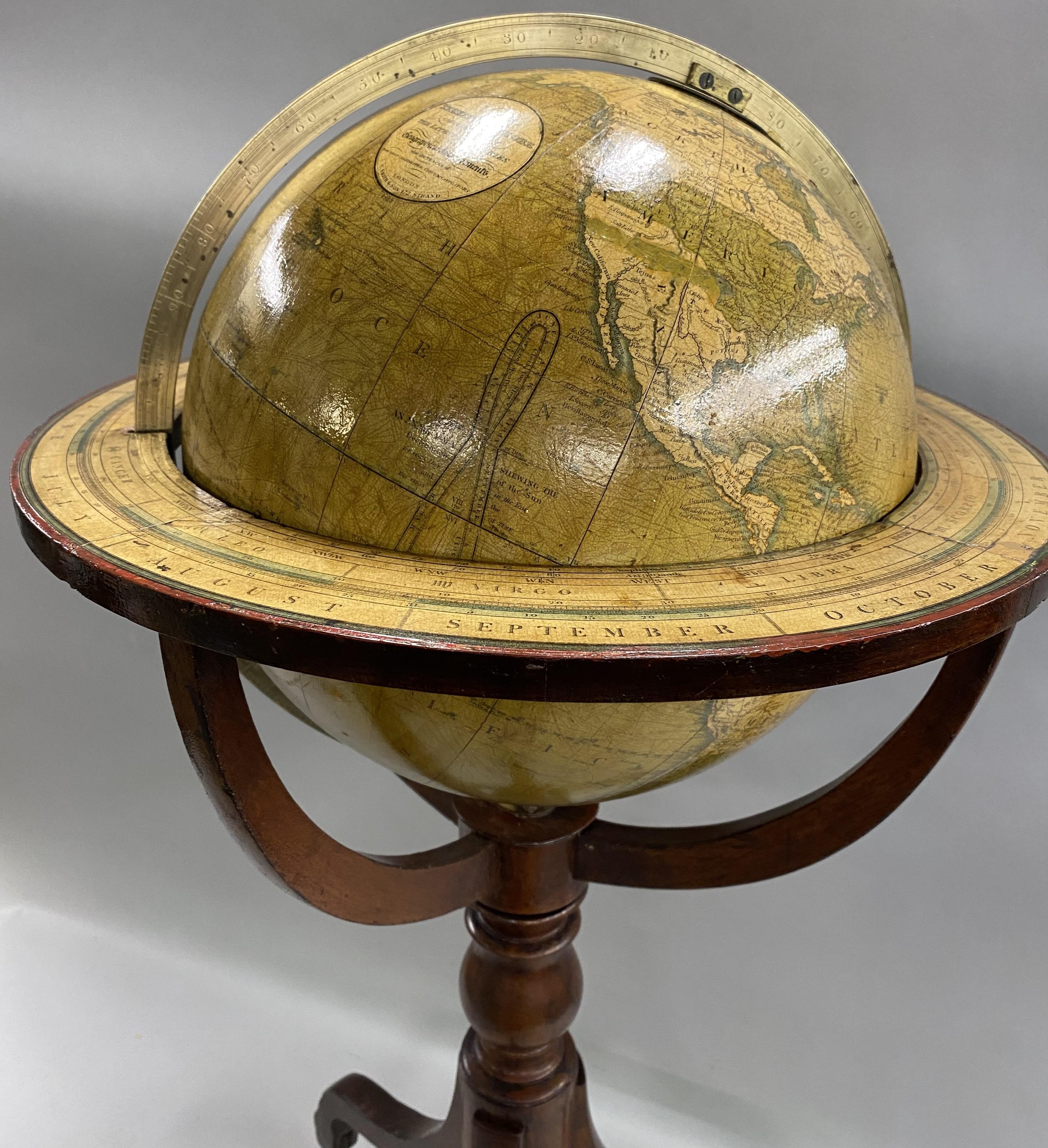 A fine example of a 12 inch diameter terrestrial table or library globe on mahogany stand with cartouche that reads “Smith’s Terrestrial Globe, containing the whole of The Latest Discoveries and Geographical Improvements, also the tracks of the most