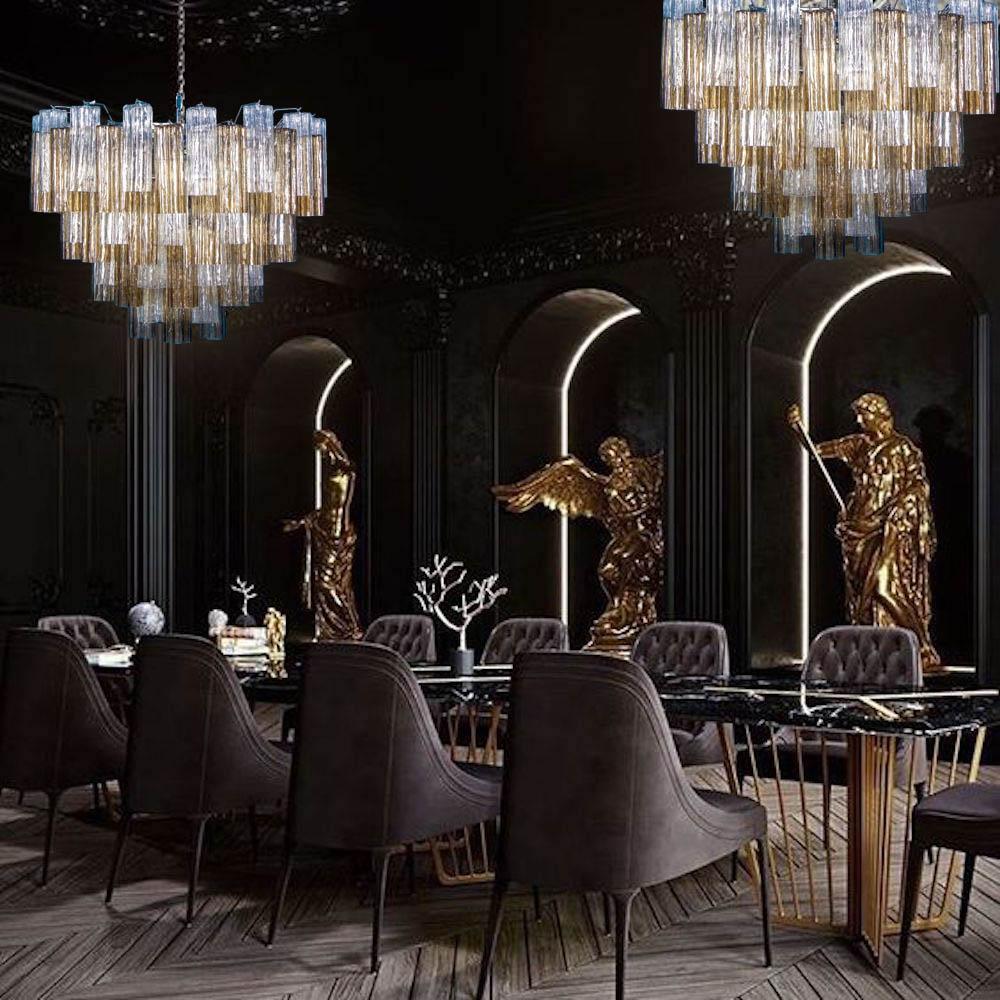 This chandelier is composed by 78 smoke and ice color Murano glass 'Tronchi'
by 20 cm high. 
Ten E 27 light bulbs. 
Measures: Height without chain( cm 60 )inches 23,60 with chain( cm 110) inches 43
Weight 50 kg circa.
 price is for one