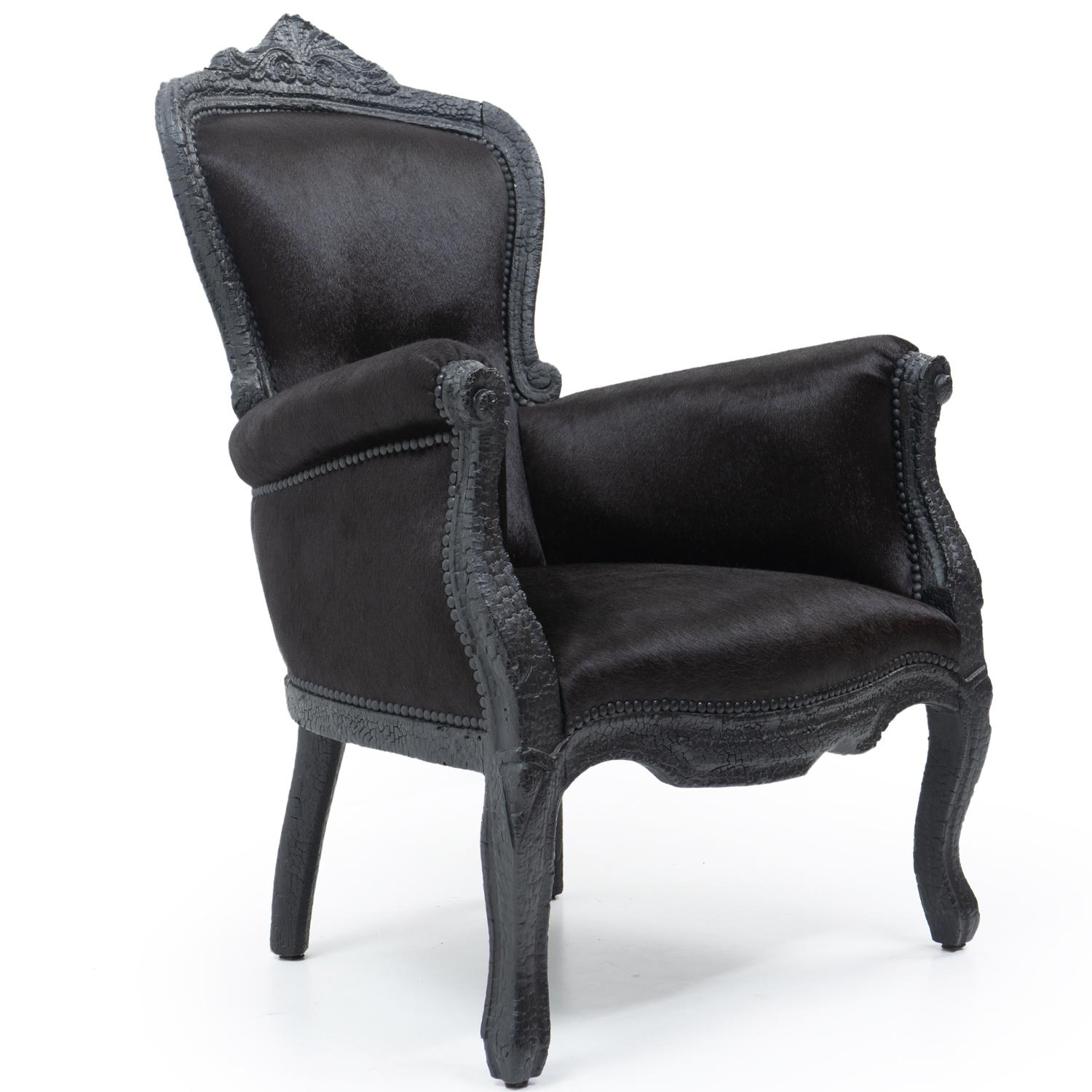Maarten Baas (the Netherlands) designed the Smoke series furniture for his 2002 graduation project at the Design Academy Eindhoven. Baas is considered one of the most influential Dutch designer of the 21st century.

His furniture is burned, then