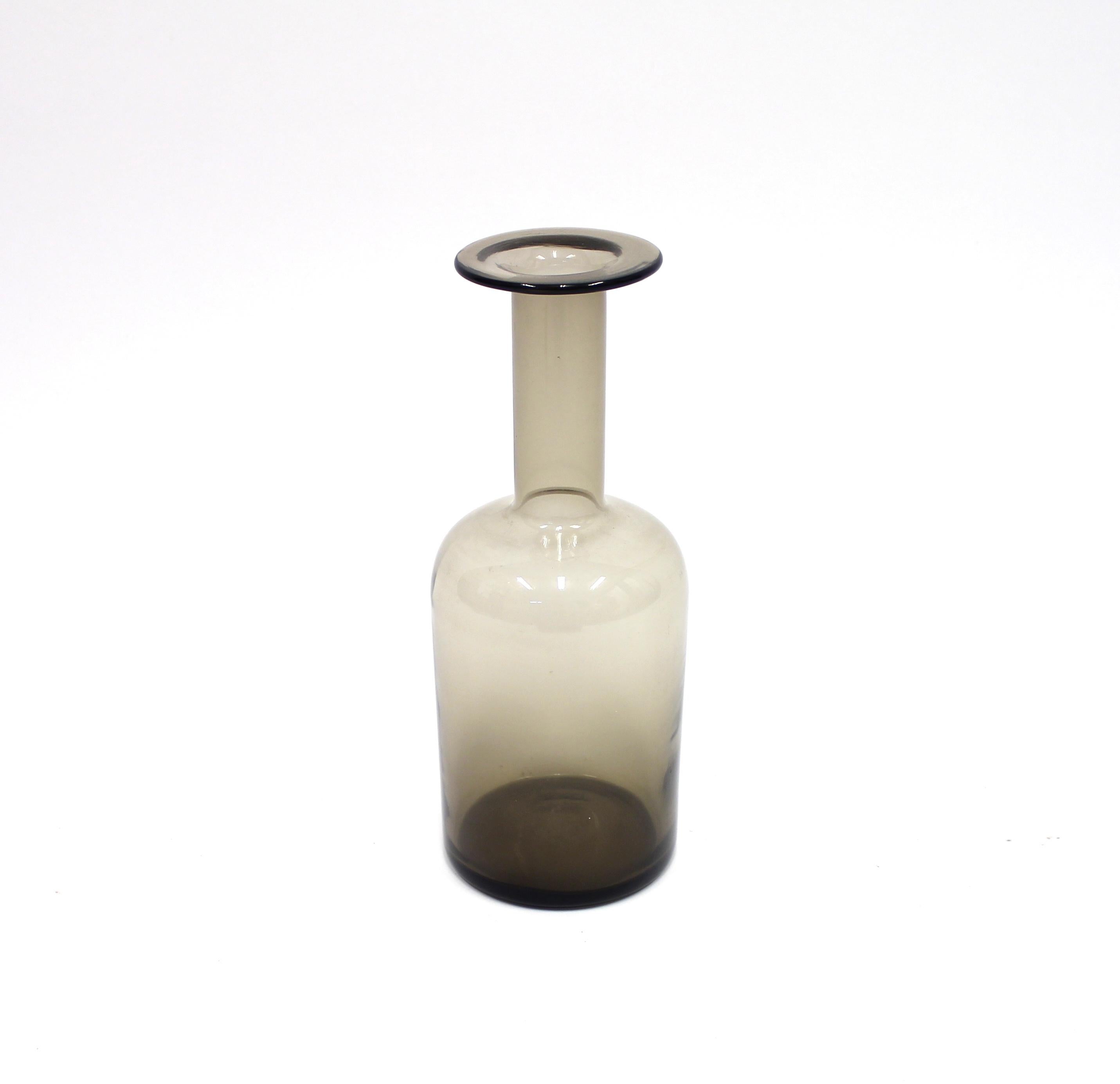 Smoke coloured, medium sized vase by Otto Brauer for Danish manufacturer Holmegaard, 1960s. Very good condition.