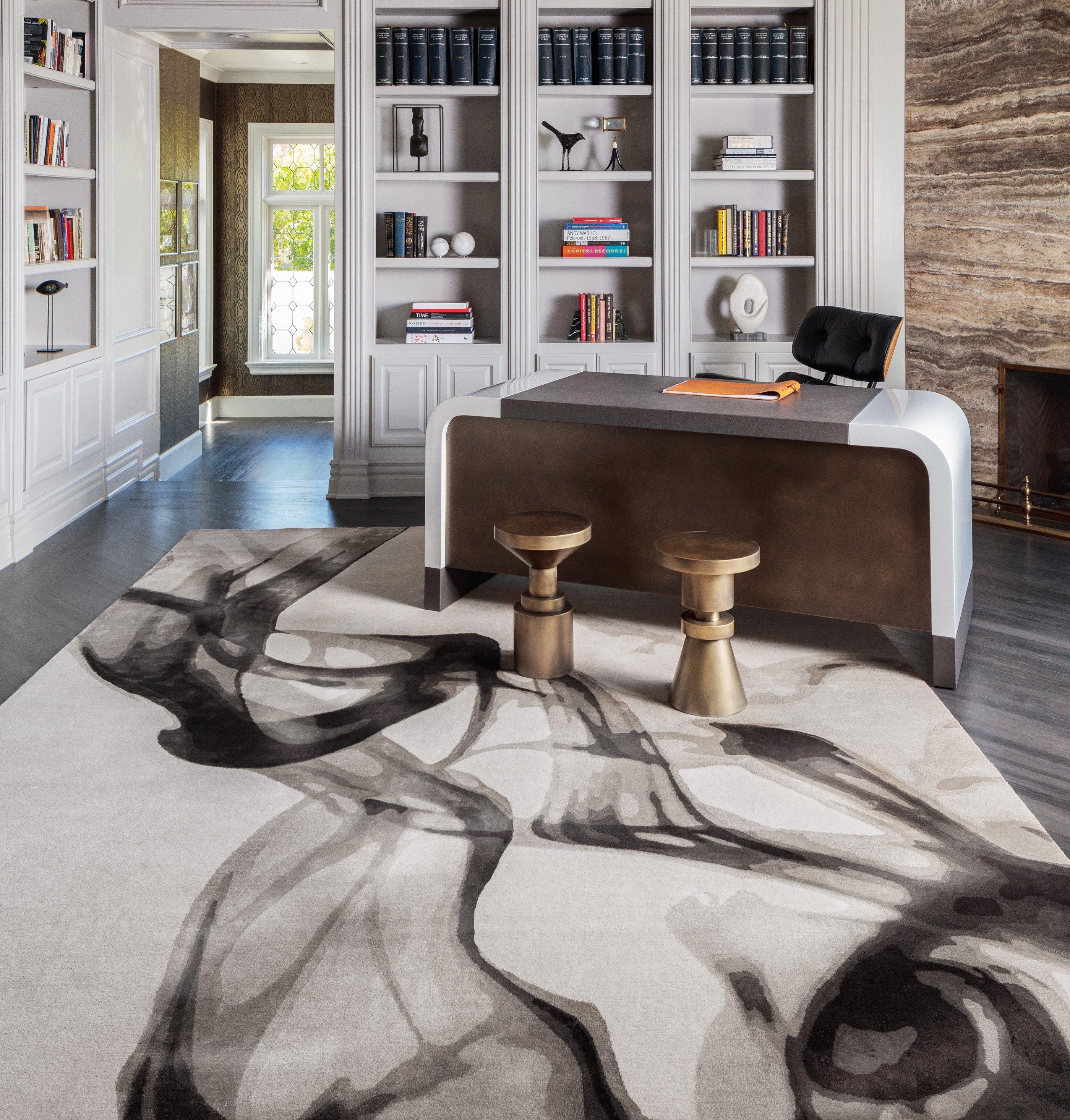 The abstract Smoke rug brings the intangible nature of smoke into the soft plane of a hand-knotted rug. Wool and silk yarns are carefully twisted and blended to achieve a subtle ethereal effect, helping to smoothly blend the 16 different shades at