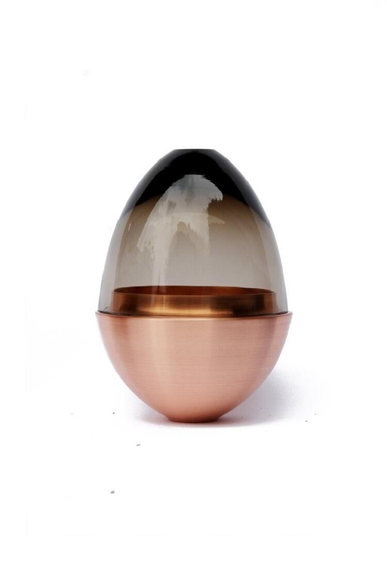 Smoke Homage to Faberge jewellery egg, Pia Wüstenberg
Dimensions: D 13.5 x H 20
Materials: glass, metal
Available in other metals: copper, copper patina

The contemporary reinterpretation of the famous jewellery egg.
Handmade in Europe: hand