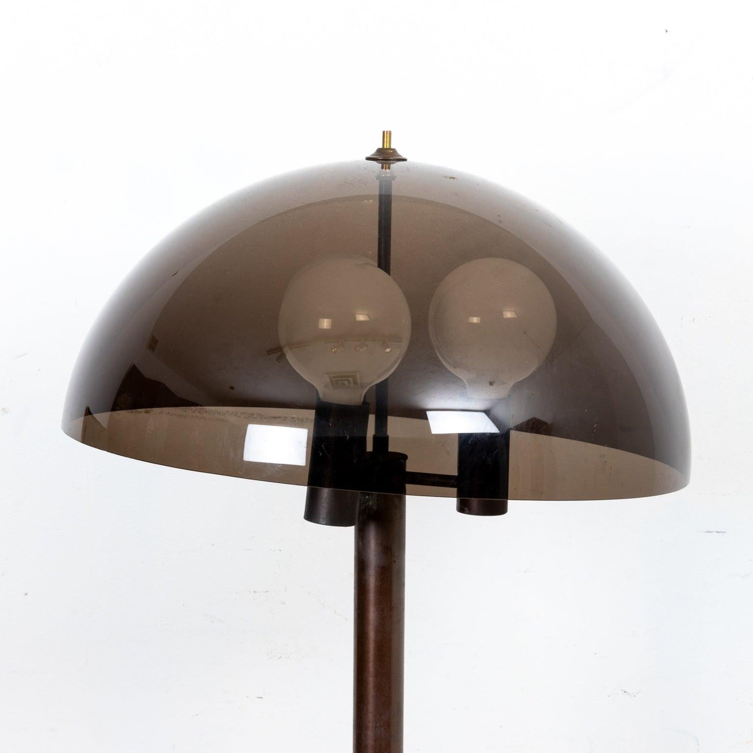 Metal Mushroom form floor lamp with smoked acrylic dome shade in the Mid-Century Modern style. Please note wear consistent with age.
 