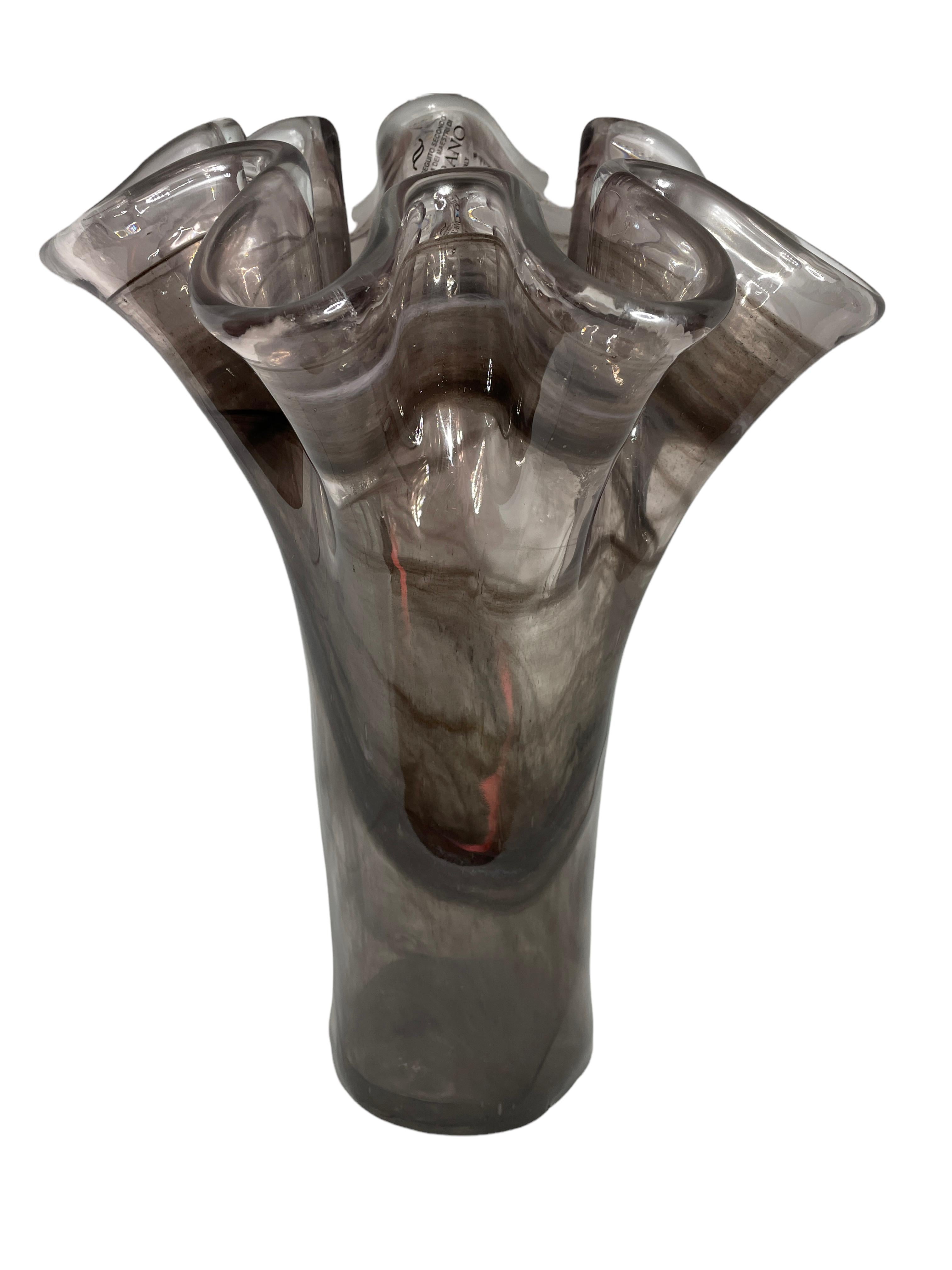 Beautiful Murano hand blown Italian art glass handkerchief vase with black, grey and clear glass swirls in the glass. Measures: 10 5/8