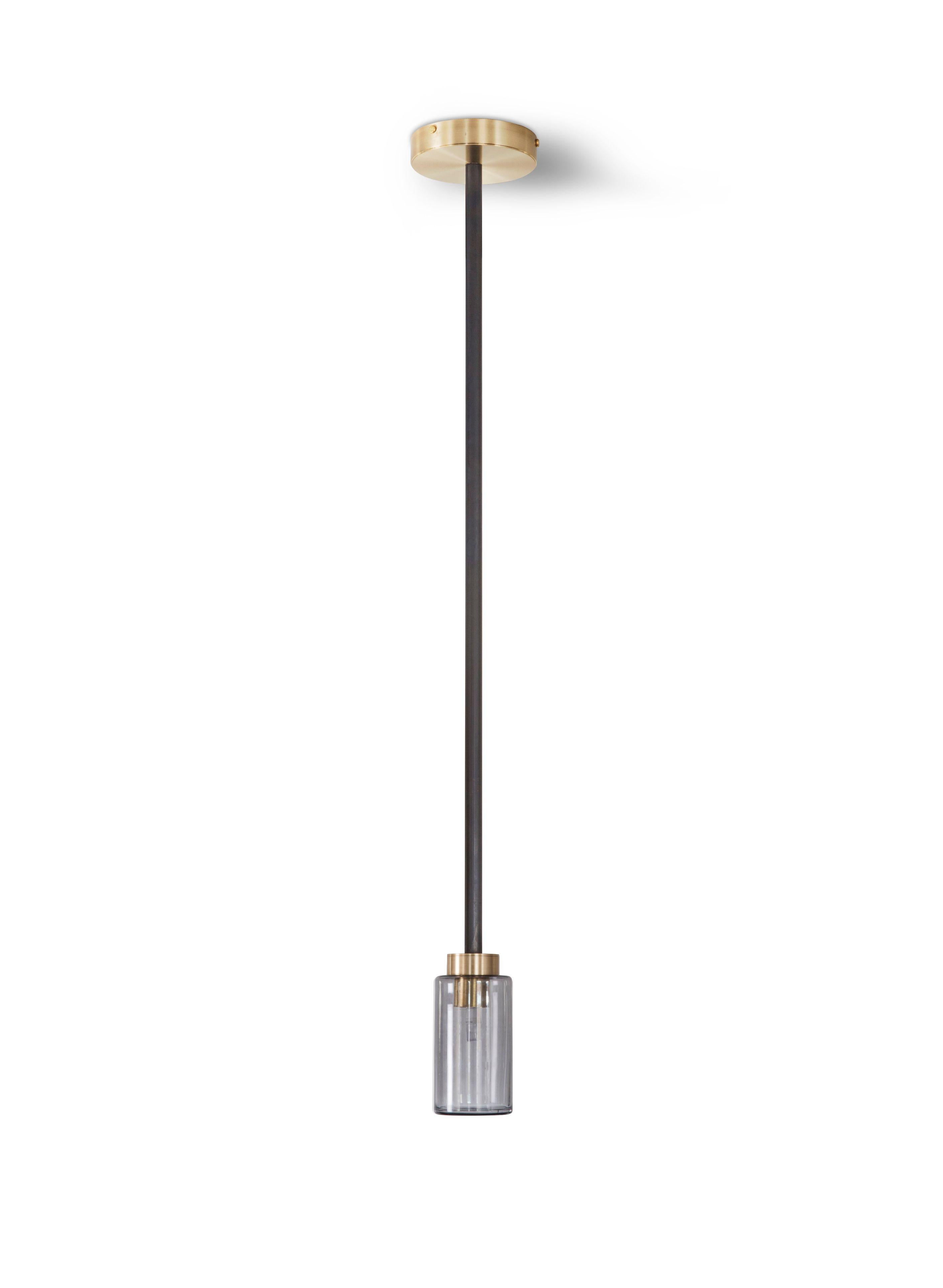 Smoked Farol pendant by Bert Frank
Dimensions: H 14 x D 7 cm
Materials: Brass, bronze 

Available finishes: Bronzed brass, black brass
All our lamps can be wired according to each country. If sold to the USA it will be wired for the USA for