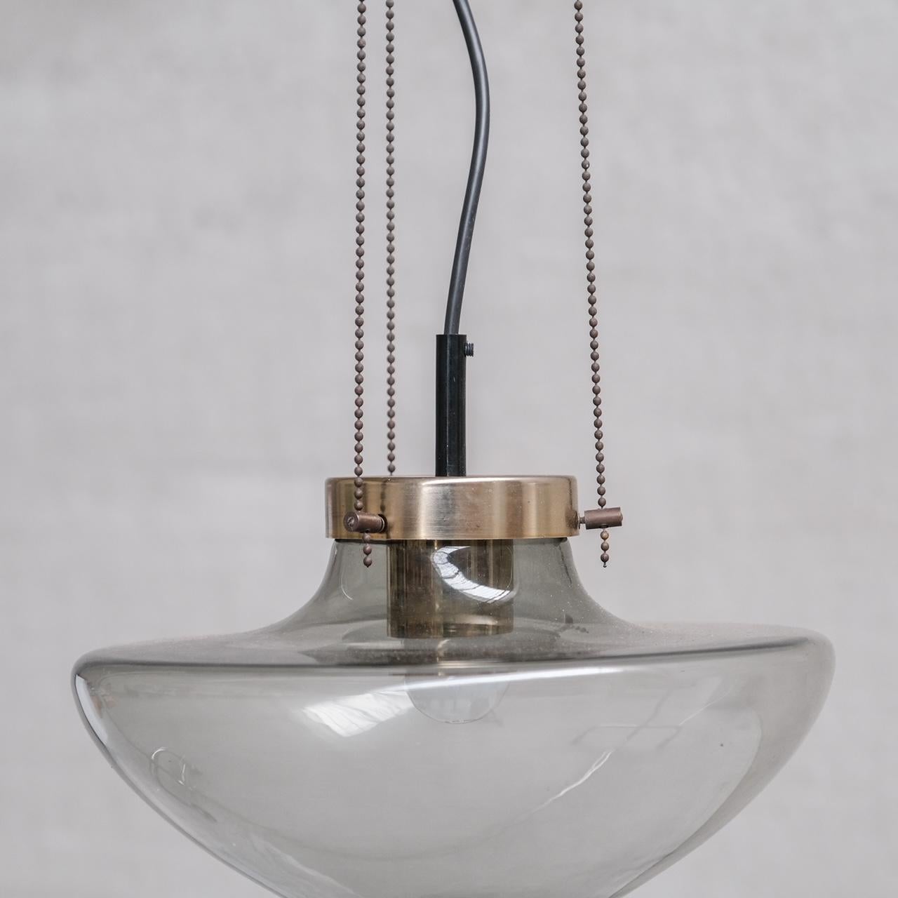 Late 20th Century Smoked Glass and Brass RAAK Pendant Light (2 Available) For Sale