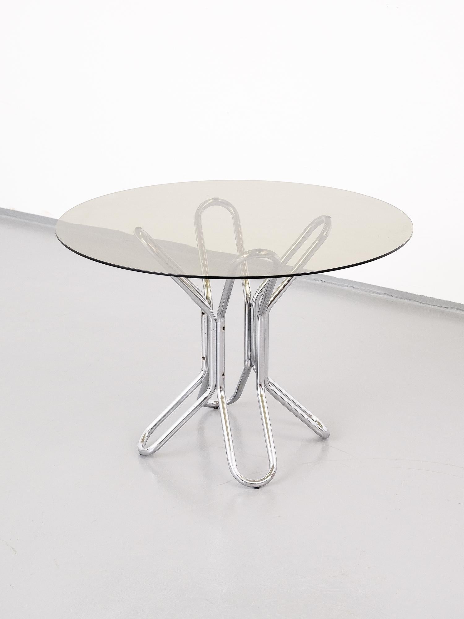 Mid-Century Modern Italian Giotto Stoppino style dining or center table with chrome base and smoked glass top.