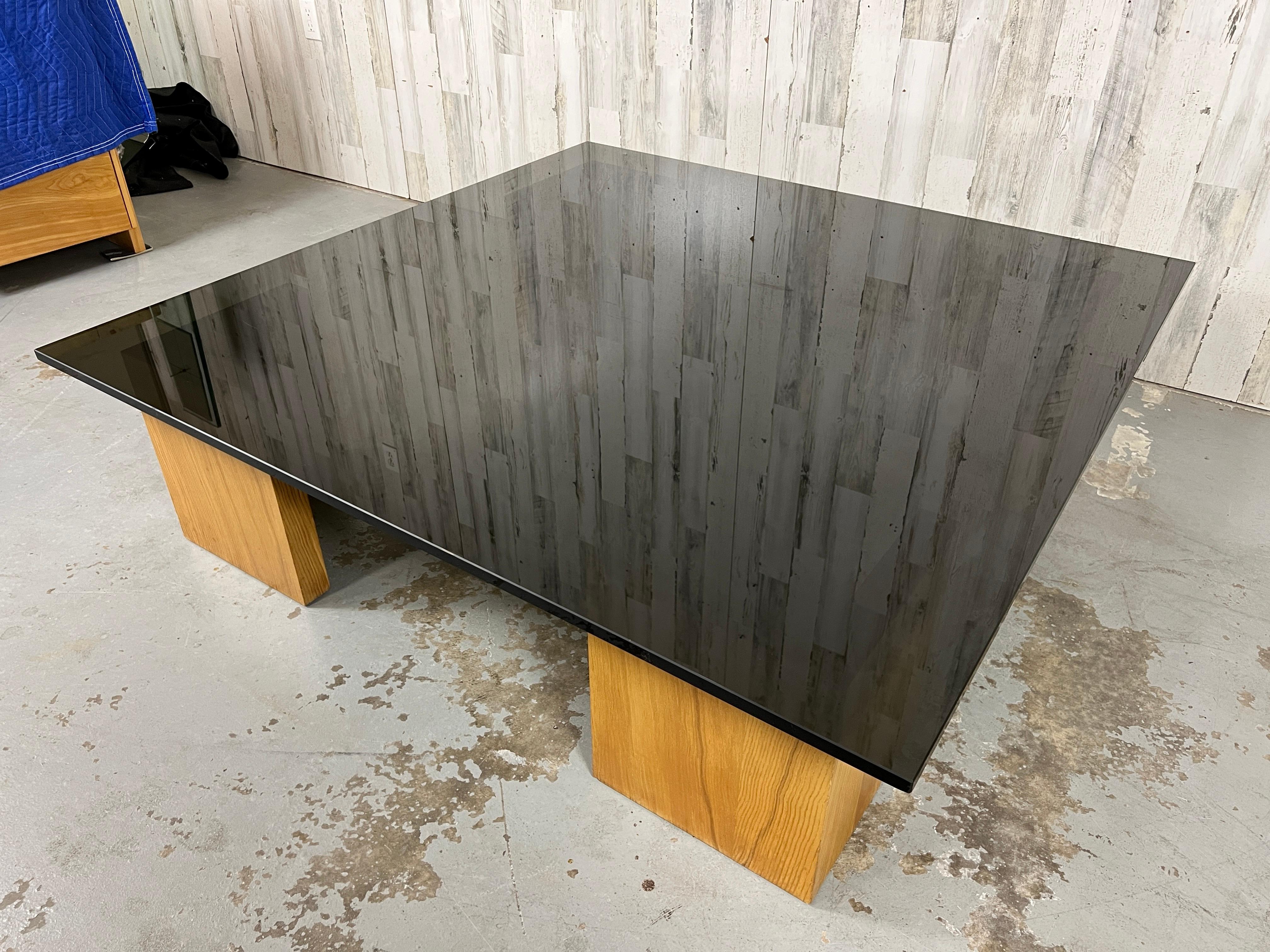 North American Smoked Glass and Wood Coffee Table For Sale