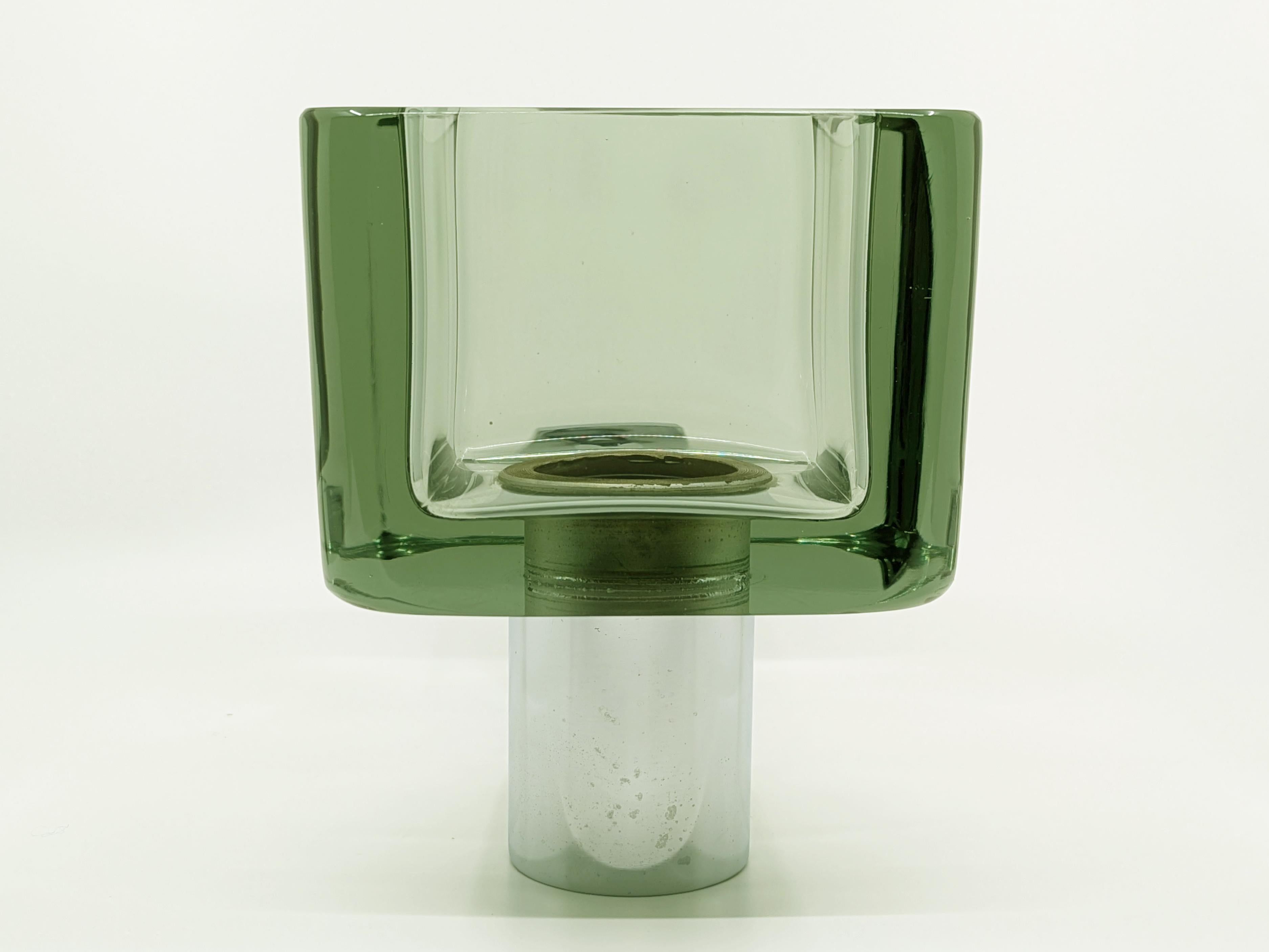 Aplique de cristal de Murano con estructura de metal cromado fabricado por la cristalería Seguso a partir de un diseño de Flavio Poli. Excelente estado.

También está disponible, de la misma serie, una importante lámpara de araña de 3 luces, como se