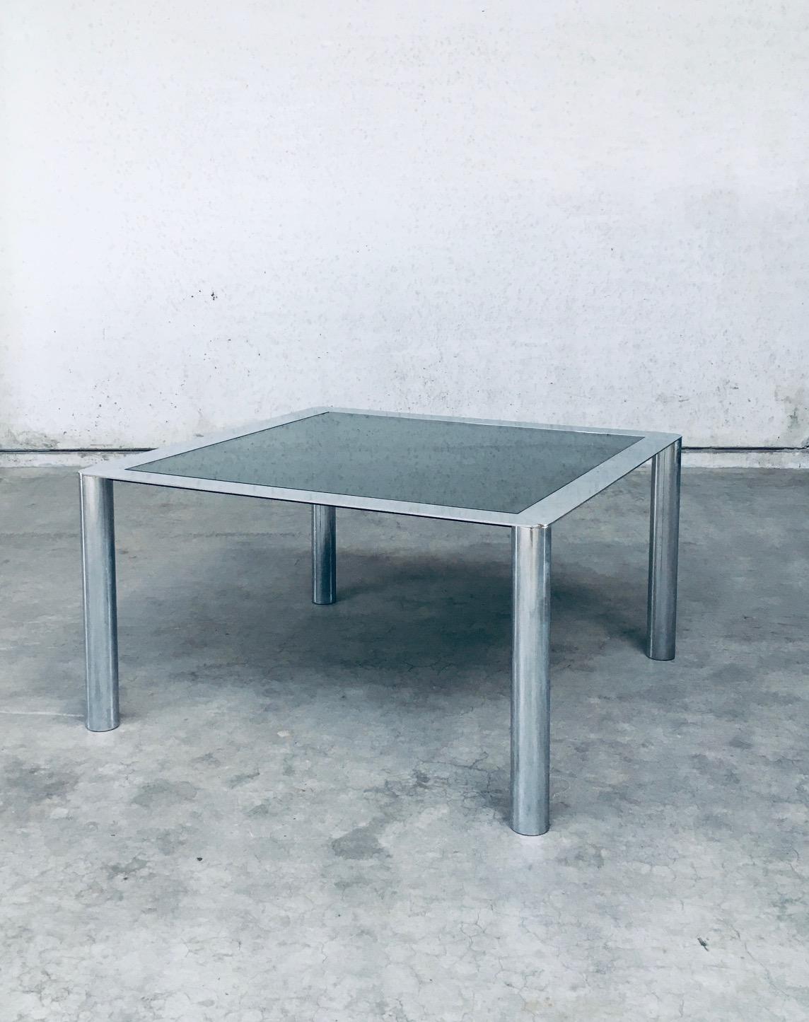 Vintage Midcentury Modern Italian Design Smoked Glass & Chromed Steel Large Square Dining Table. Designed by Sergio Mazza for Cinova. Made in Italy 1970's period. This is a majestic dining table that easily seats 6 to 8 people. This comes in good