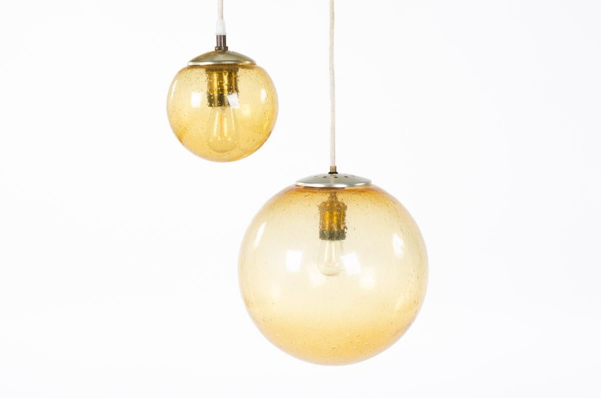 Pendant light edited by Parscot in the 70s
Ceiling fixing with 4 cotton threads ending by smoked glass lights.