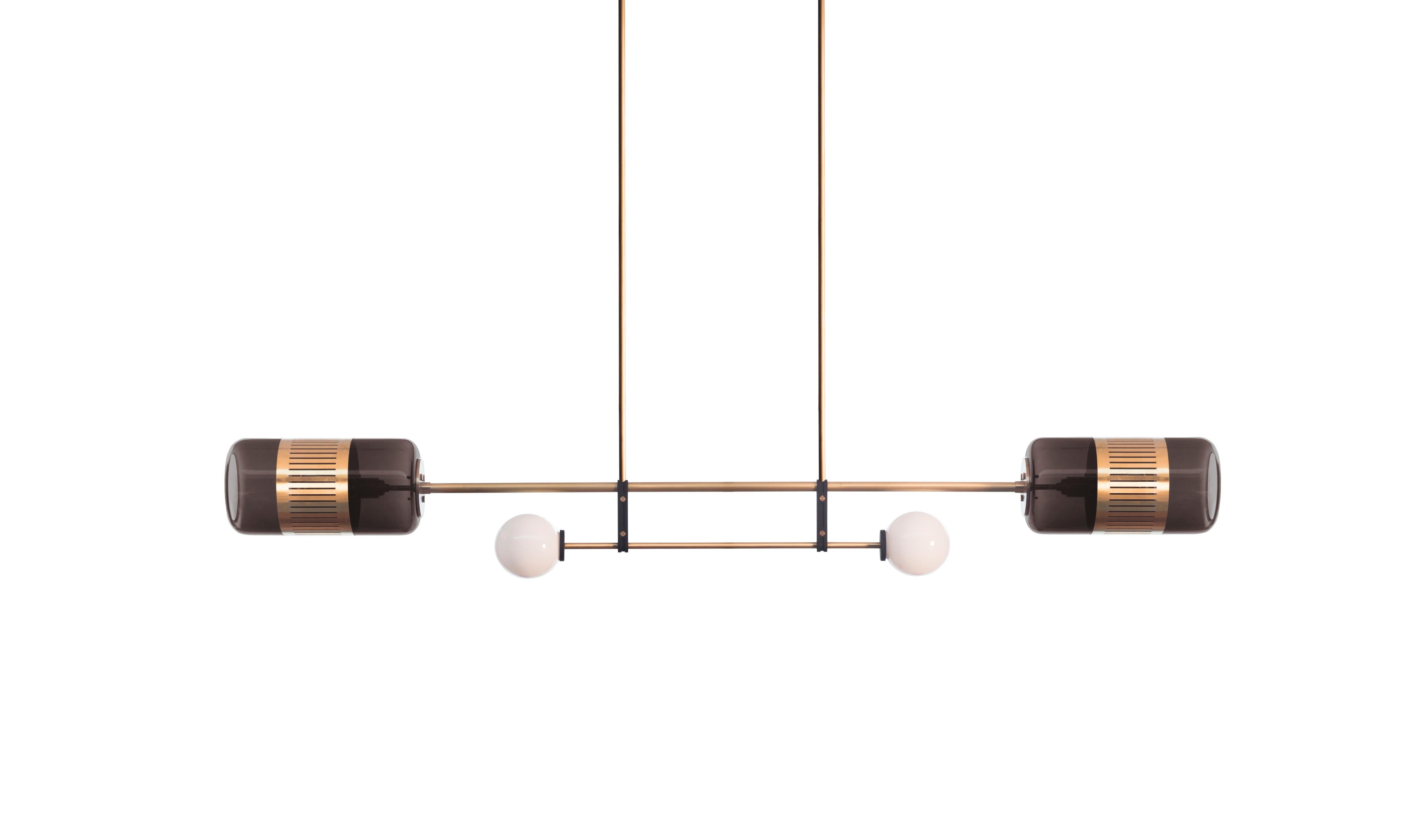 Smoked Lizak pendant by Bert Frank
Dimensions: H 180 x W 180 x D 28 cm
Materials: Brass and glass

Available finishes: Brass, opal + blue
All our lamps can be wired according to each country. If sold to the USA it will be wired for the USA for