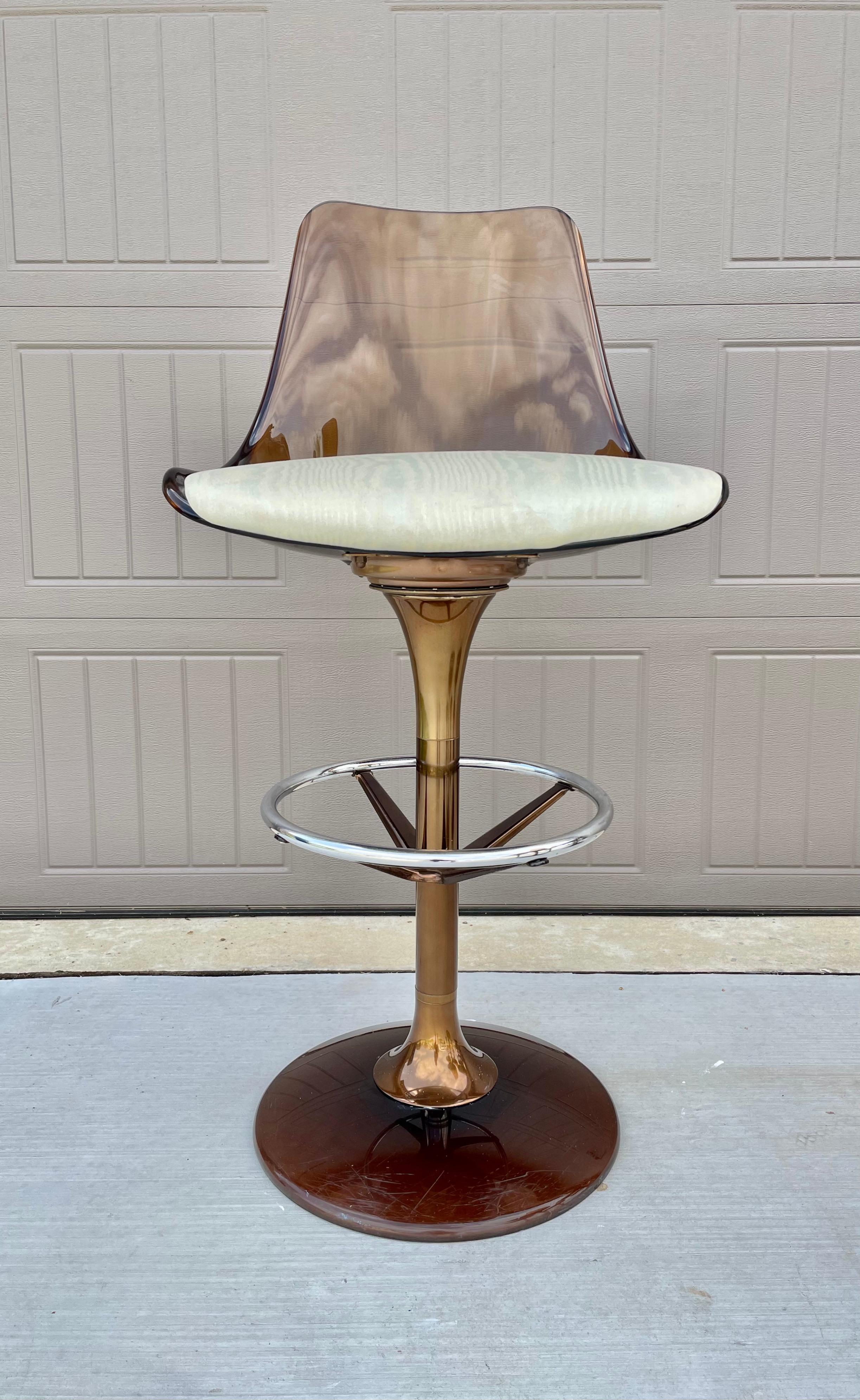 A unique combination of smoked Lucite, chrome, and copper plated barstools attributed to chrome craft. These will complete any retro/modern bar. It is very rare to find a set of 6 of these.
