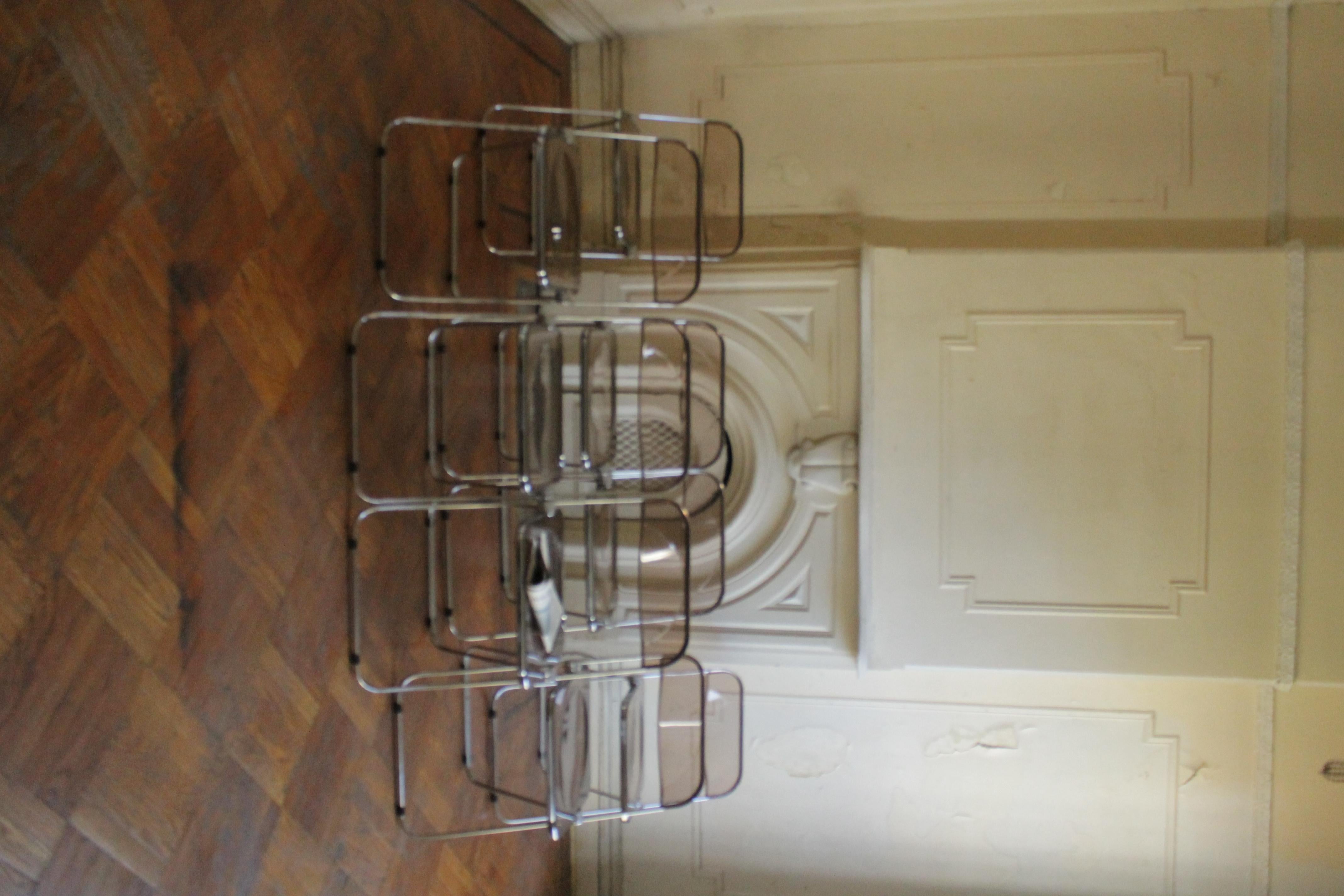 Italian Smoked Lucite and Chrome Plia folding chairs by Giancarlo Piretti for Castelli For Sale