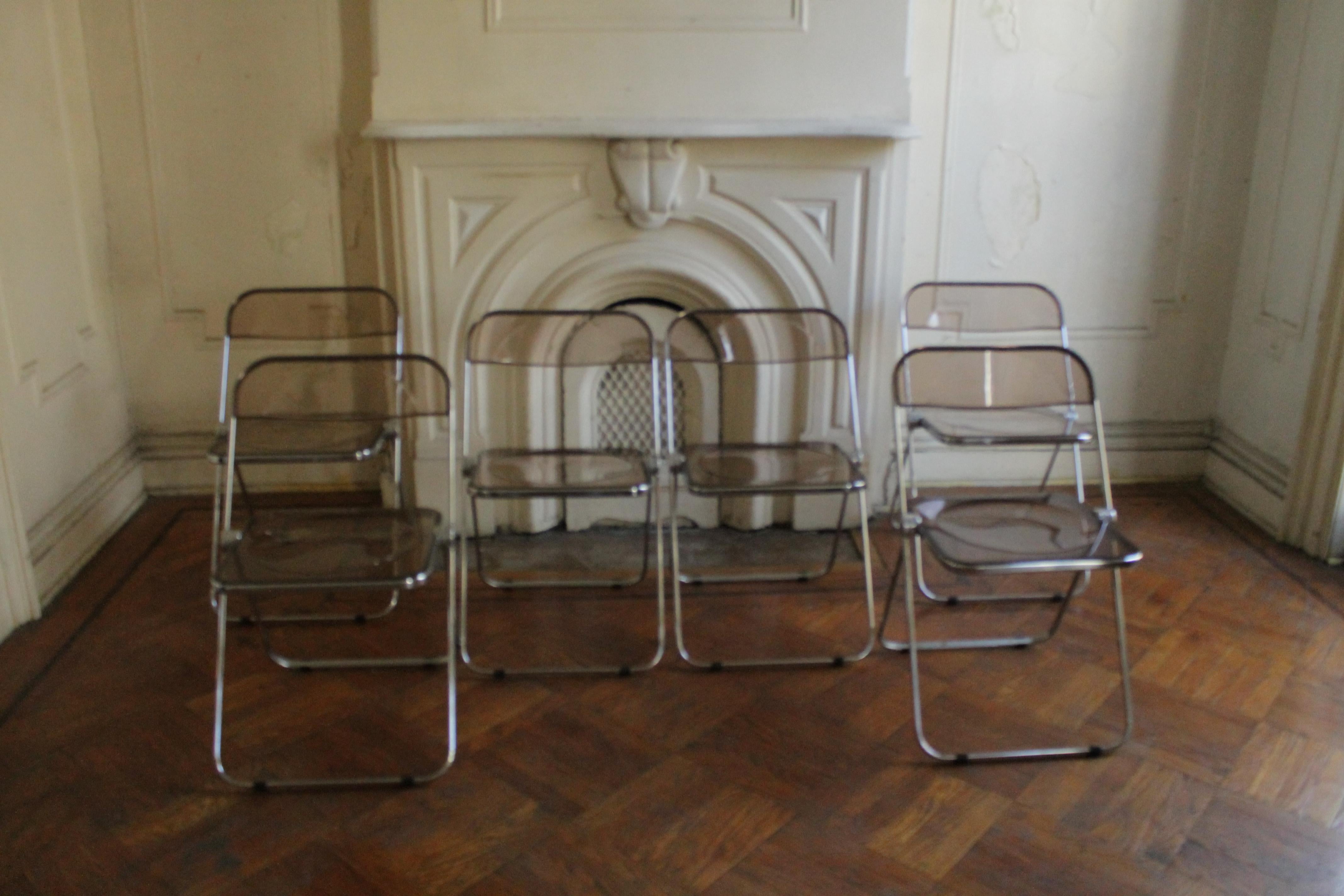 Smoked Lucite and Chrome Plia folding chairs by Giancarlo Piretti for Castelli In Good Condition For Sale In Brooklyn, NY