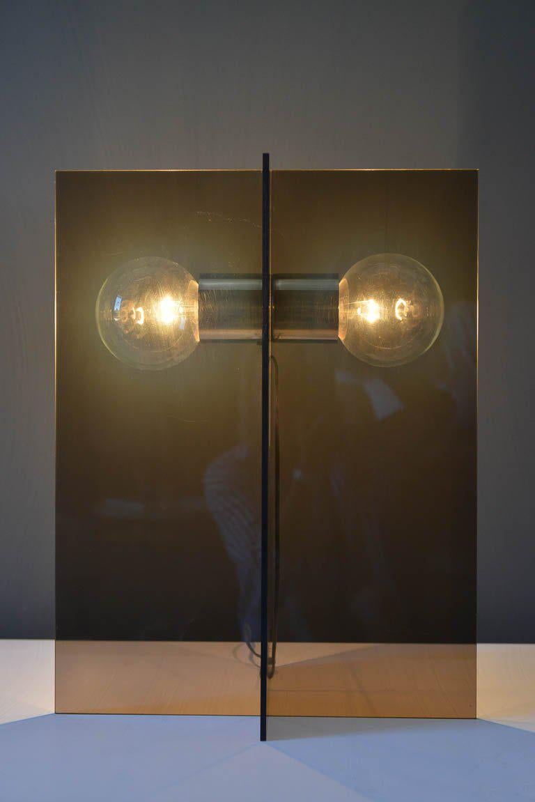 Smoked Lucite table lamp with unique Lucite panels and original hardware. Original wiring in good condition. Lucite is clear and free from clouding or cracking.

Measures: 22