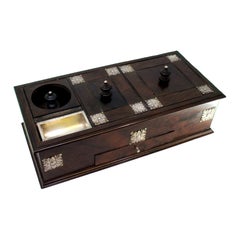 Smoker's box in rosewood with several compartments and silver applications