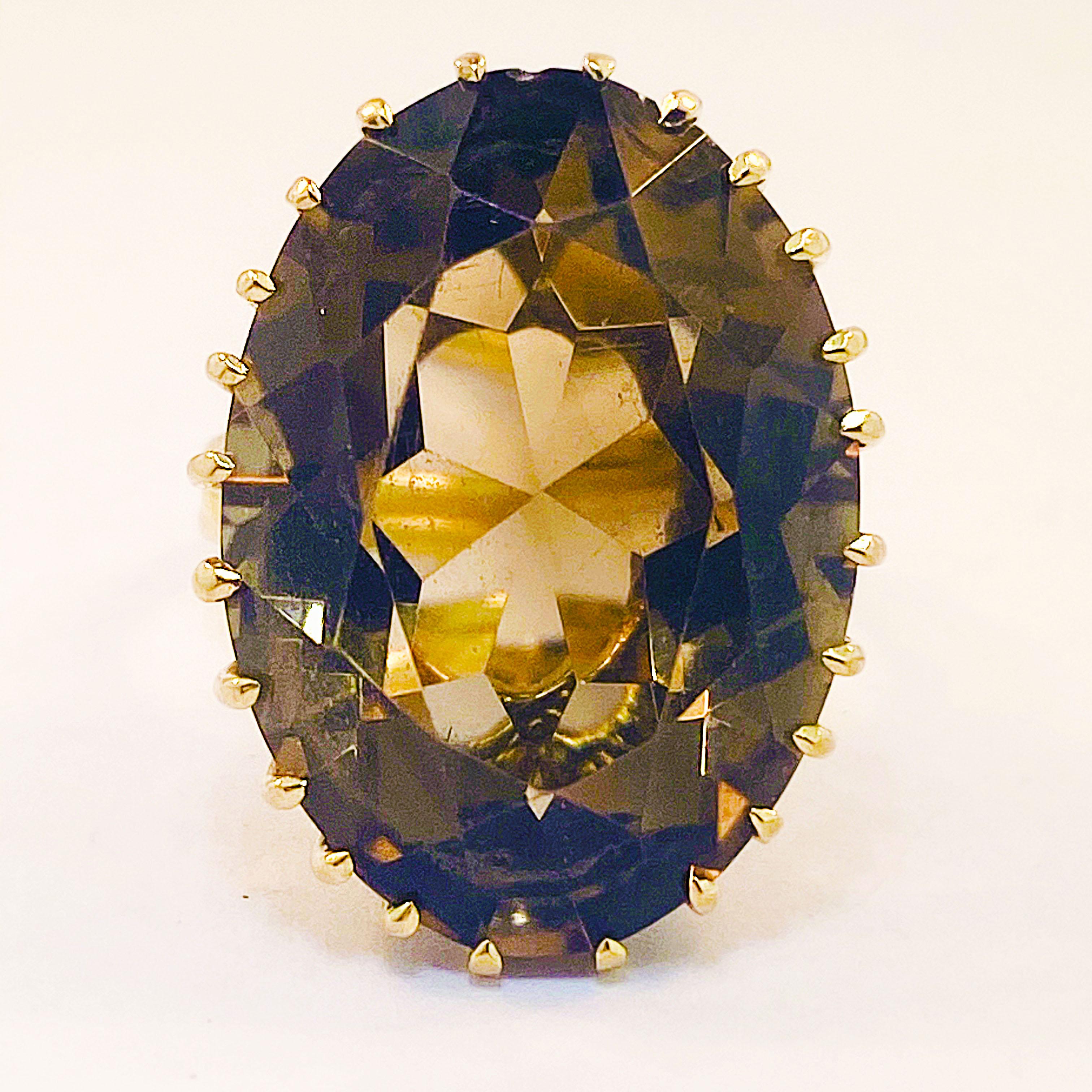 The gorgeous antique designed ring is a custom, one of a kind fine jewelry piece. The ring has a stunning, multi-prong ring setting with 24 pointed prongs holding the gorgeous, genuine Smokey Quartz gemstone in place. The smokey quartz has an
