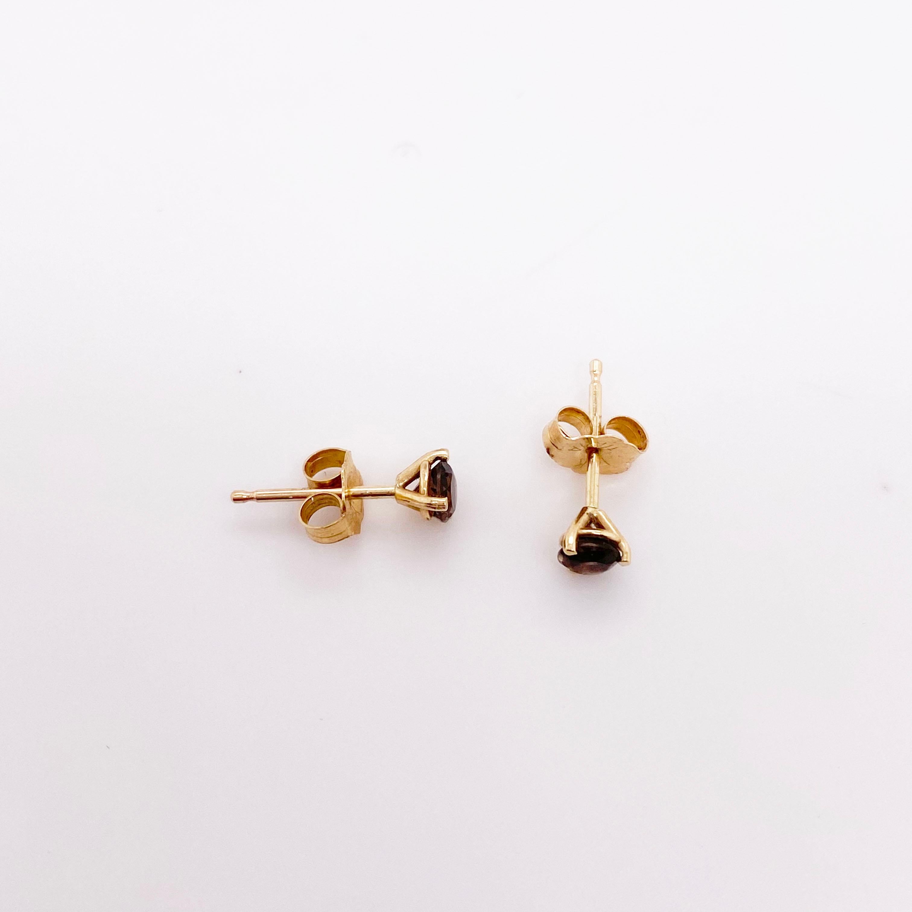 These are the perfect earrings for a minimalist look! The earrings are 3.5 mm (.11 carats each). The details for these gorgeous earrings are listed below:
Metal Quality: 14 kt Yellow Gold  
Earring Type: Stud
Gemstone: Smokey Quartz
Gemstone Weight: