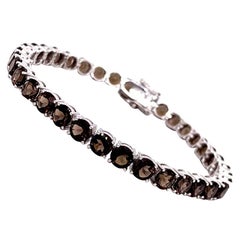 Bracelet tennis en or blanc 10 carats avec topaze fumée