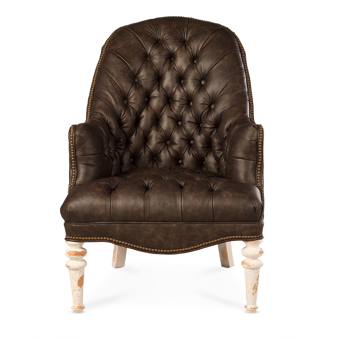 An American Made classic tufted leather chair. With a deep tufted arched backrest, seat, and arms. These accent chairs have a unique opposing diamond quilted pattern outside. With natural brass nailhead trim details, it is raised on turned and