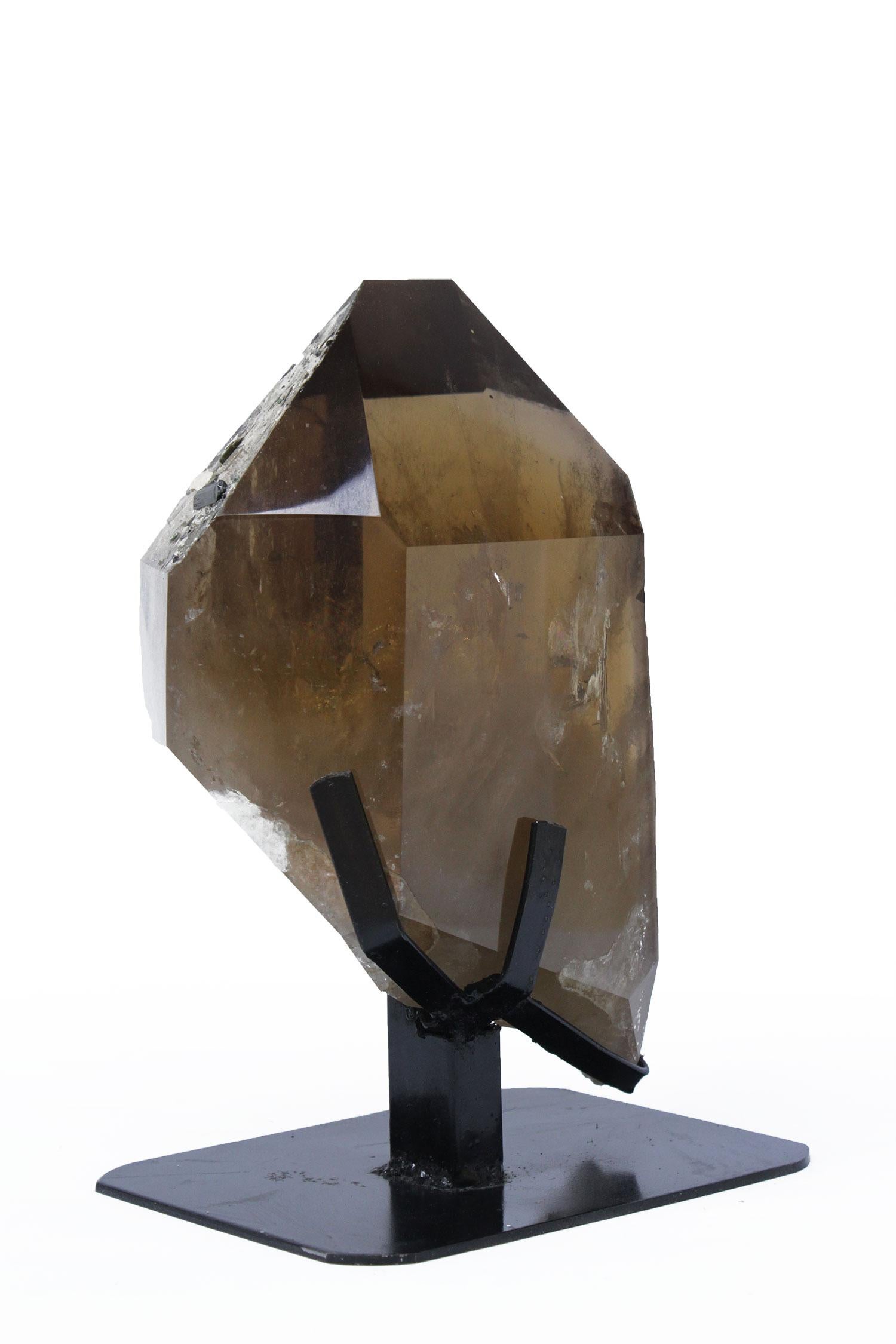 Museum-quality smoky citrine crystal point on a custom black stand. Citrine is a gem that is valued for its yellow to brownish color. It is a  yellow variety of quartz, so its name comes from the old French word for lemon. This is a rare specimen of