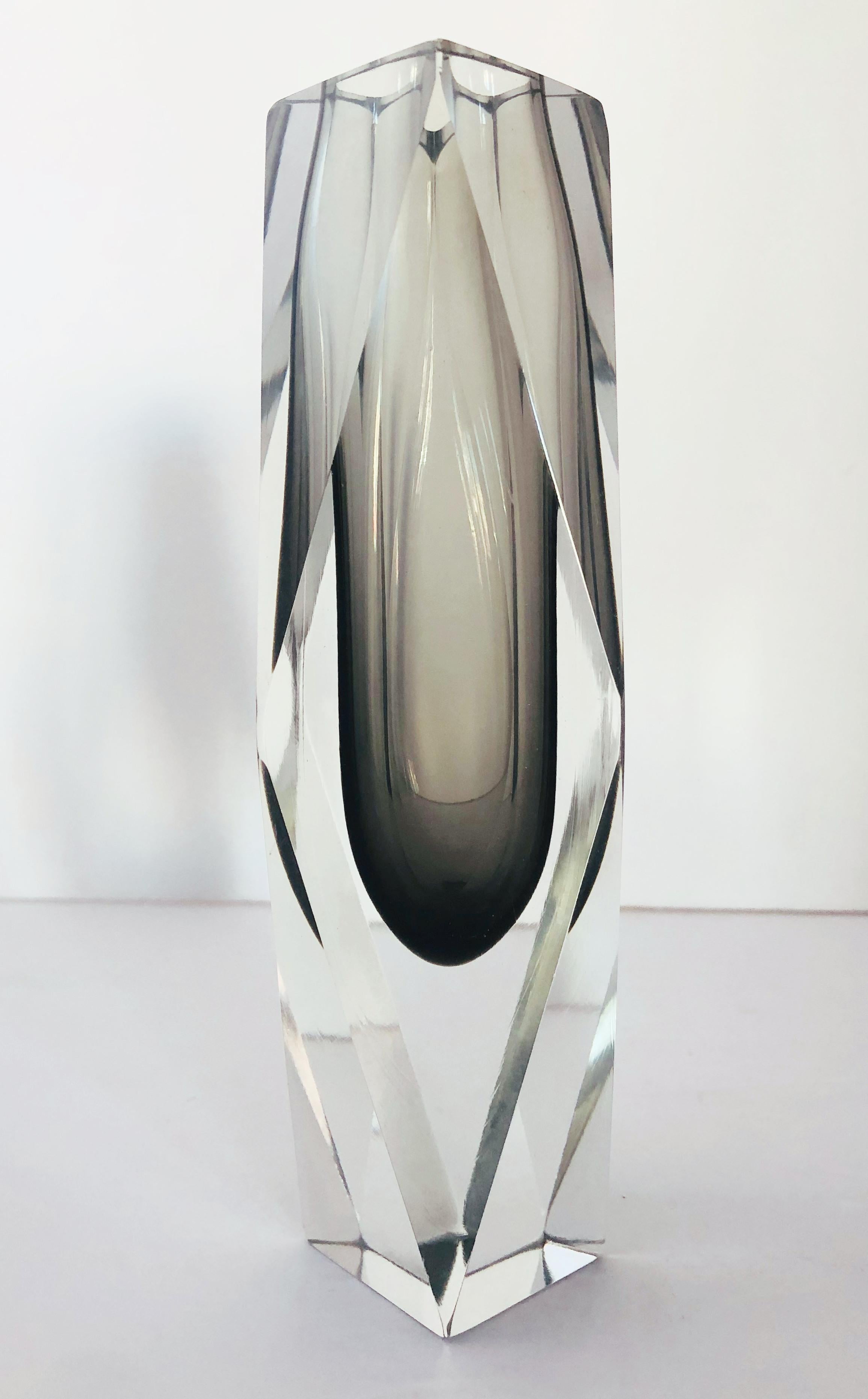 Vintage Italian smoky faceted Murano glass vase blown in Sommerso technique / Designed by Mandruzzato circa 1960s / Made in Italy
Measures: Height 8 inches / diameter 2.5 inches
1 in stock in Palm Springs currently ON FINAL CLEARANCE SALE for $399