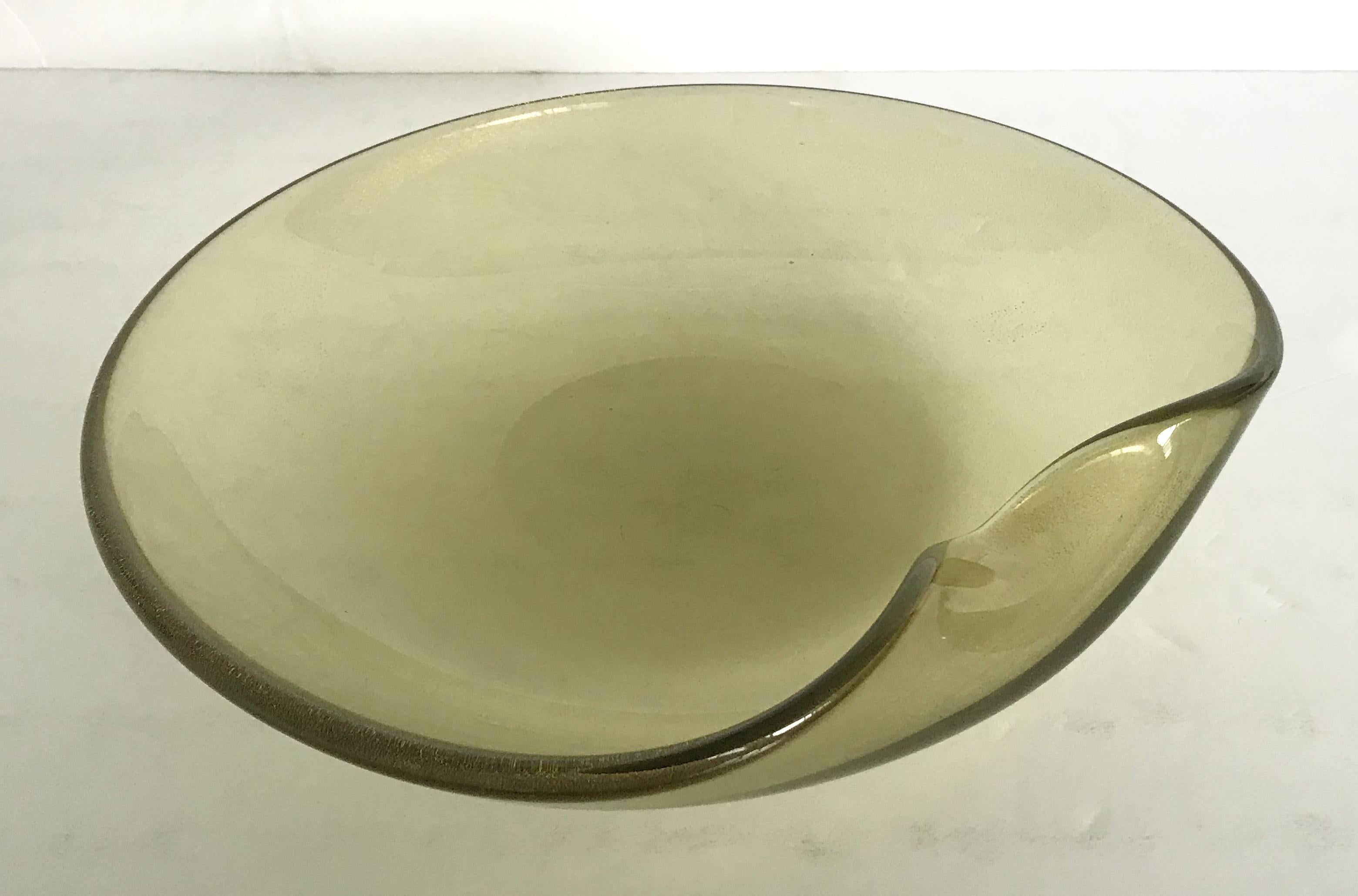 Vintage smoky Murano glass tray or centerpiece infused with gold flecks / Made in Italy, circa 1960s 
Measures: width 12 inches, depth 10 inches, height 2 inches 
1 in stock in Los Angeles
Order reference #: FABIOLTD G193
This piece makes for a