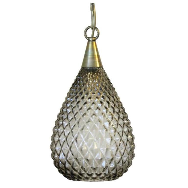 Italian pendant with smoky Murano glasses and diamond shaped details, mounted on brass frame / Designed by Fabio Bergomi for Fabio Ltd / Made in Italy 
1 light / E12 type / max 60W 
Height: 13 inches plus chain and canopy / Diameter: 7 inches
4 in