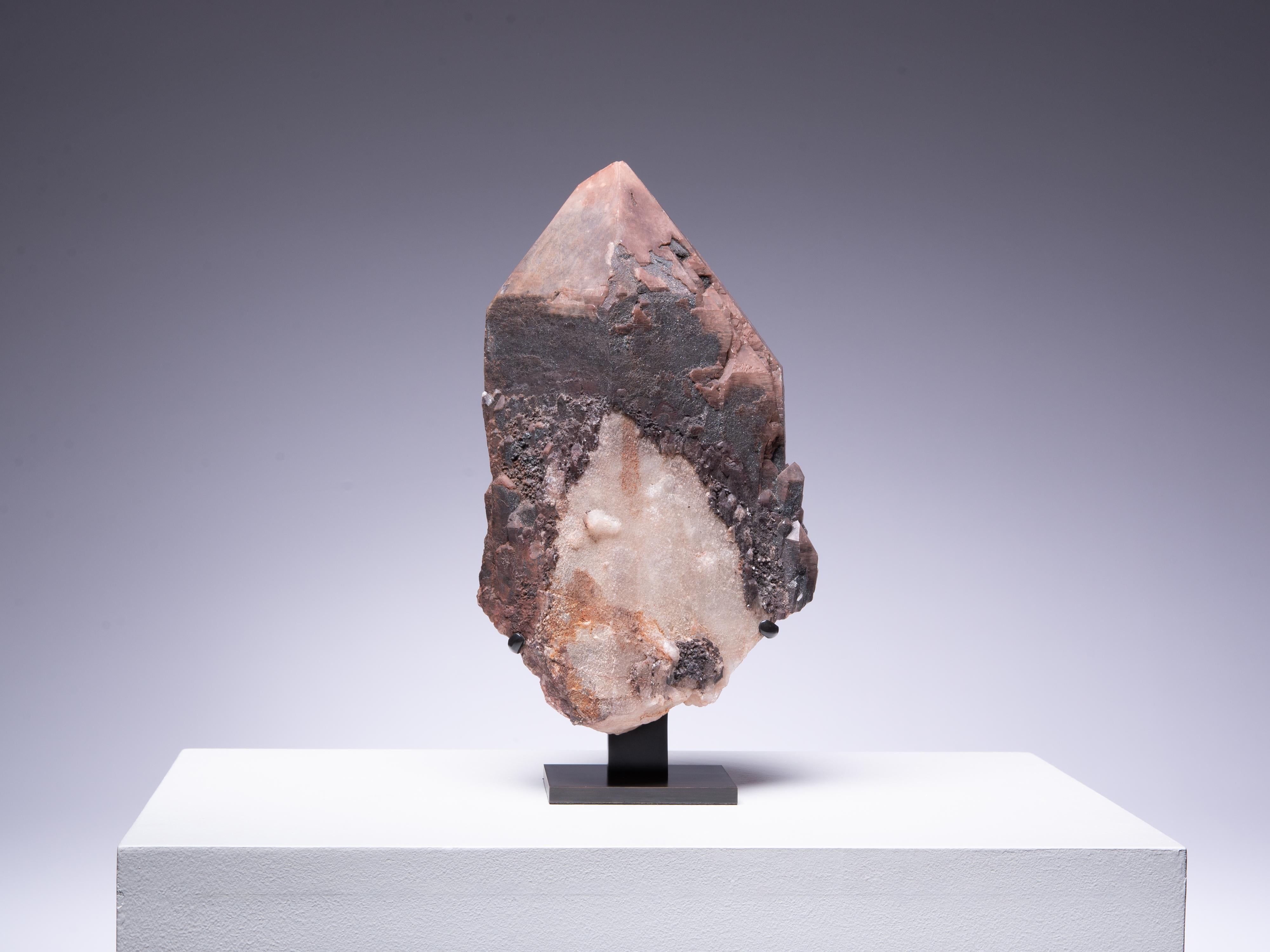 A sculptural piece of smoky quartz with haematite inclusions and iron
oxide coating. Part of a striking new discovery from Amazonia that has been referred to as 