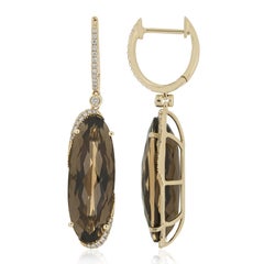 Nieten-Ohrring aus 14 Karat Gelbgold mit Rauchquarz und Diamant