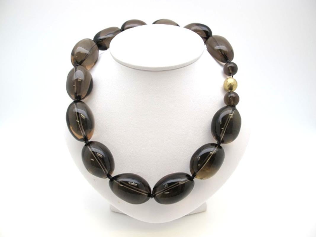 This impressive smoky quartz beaded necklace is a real attention-getter! Each bean-shaped bead measures approximately 30 x 22 x 20mm (1-1/4 x 1 x 3/4