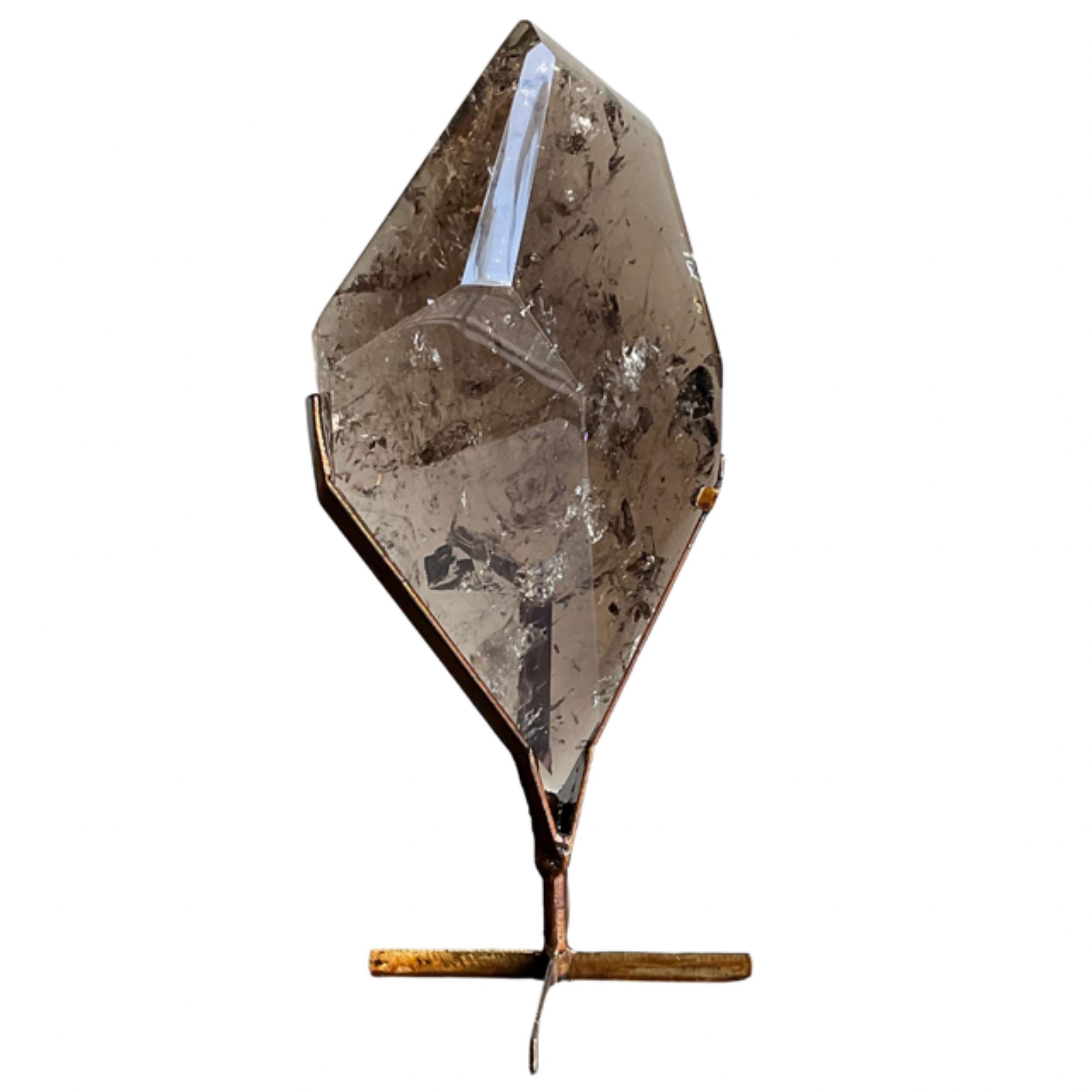 Large smoky quartz crystal slab on metal stand.
Large facets on the front side.
Flat on the back side
Beautiful natural color smoky quartz crystal

 Height: 12