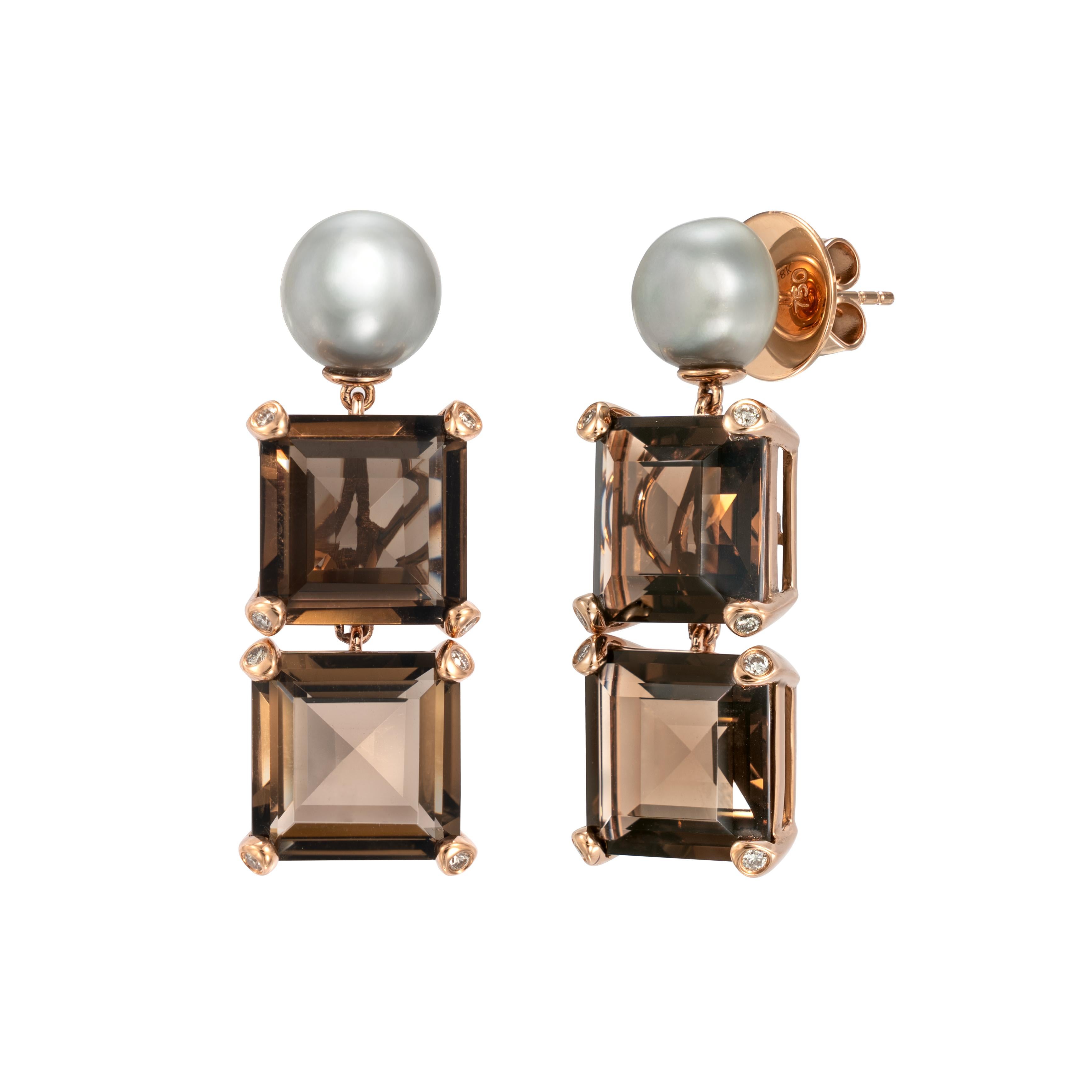 Light and easy to wear these earrings showcase smoky quartz accented with pearls and diamonds. These earrings are dainty yet have a great pop of color from the vibrant gems.

Smoky Quartz Earrings with Pearls & Diamond in 18 Karat Rose Gold

Smoky