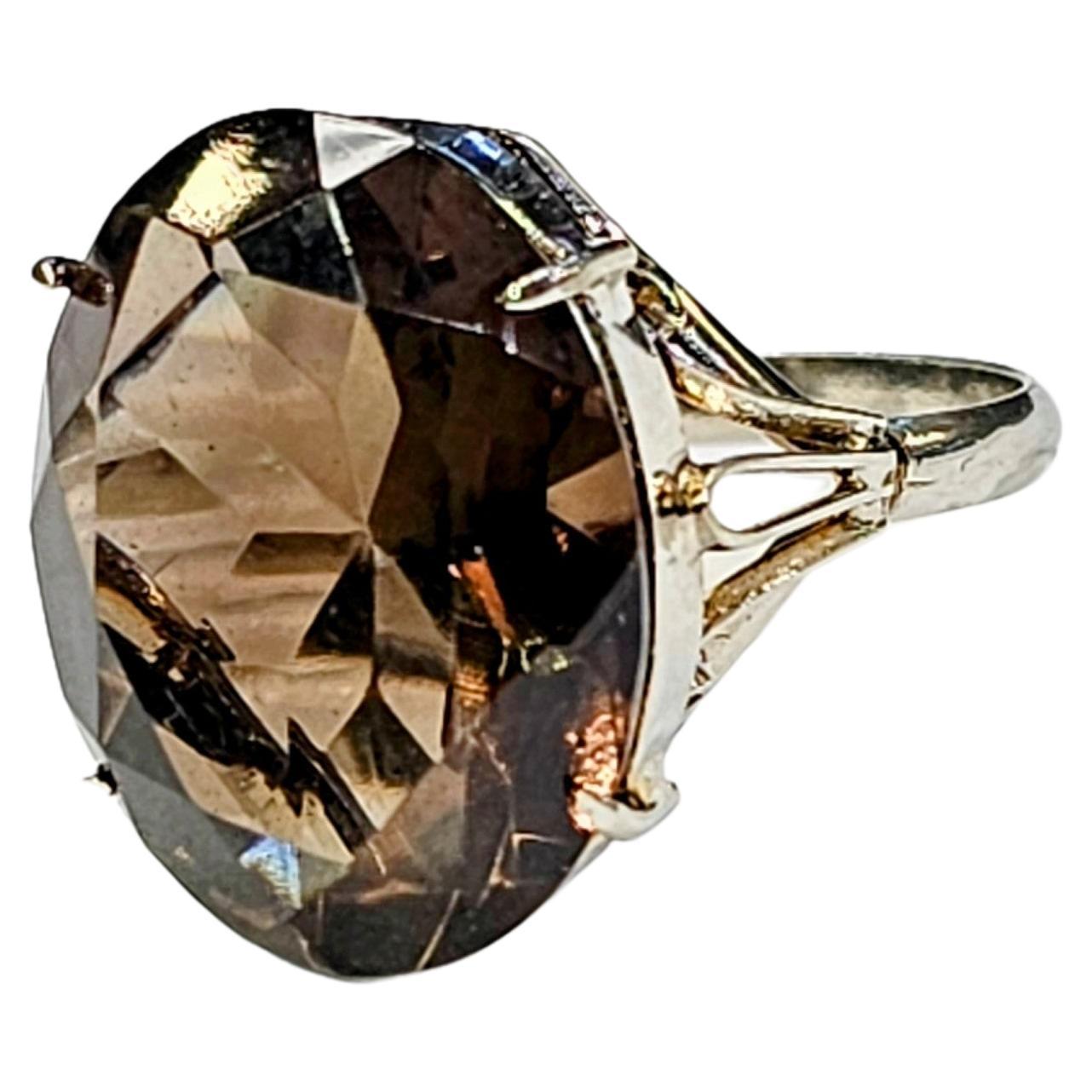 Smoky Quartz Ring

A 10 karat white gold ring set with a large oval smoky quarts

Gross Weight: 5.4 grams

Ring Size: 8

Resizable free of charge