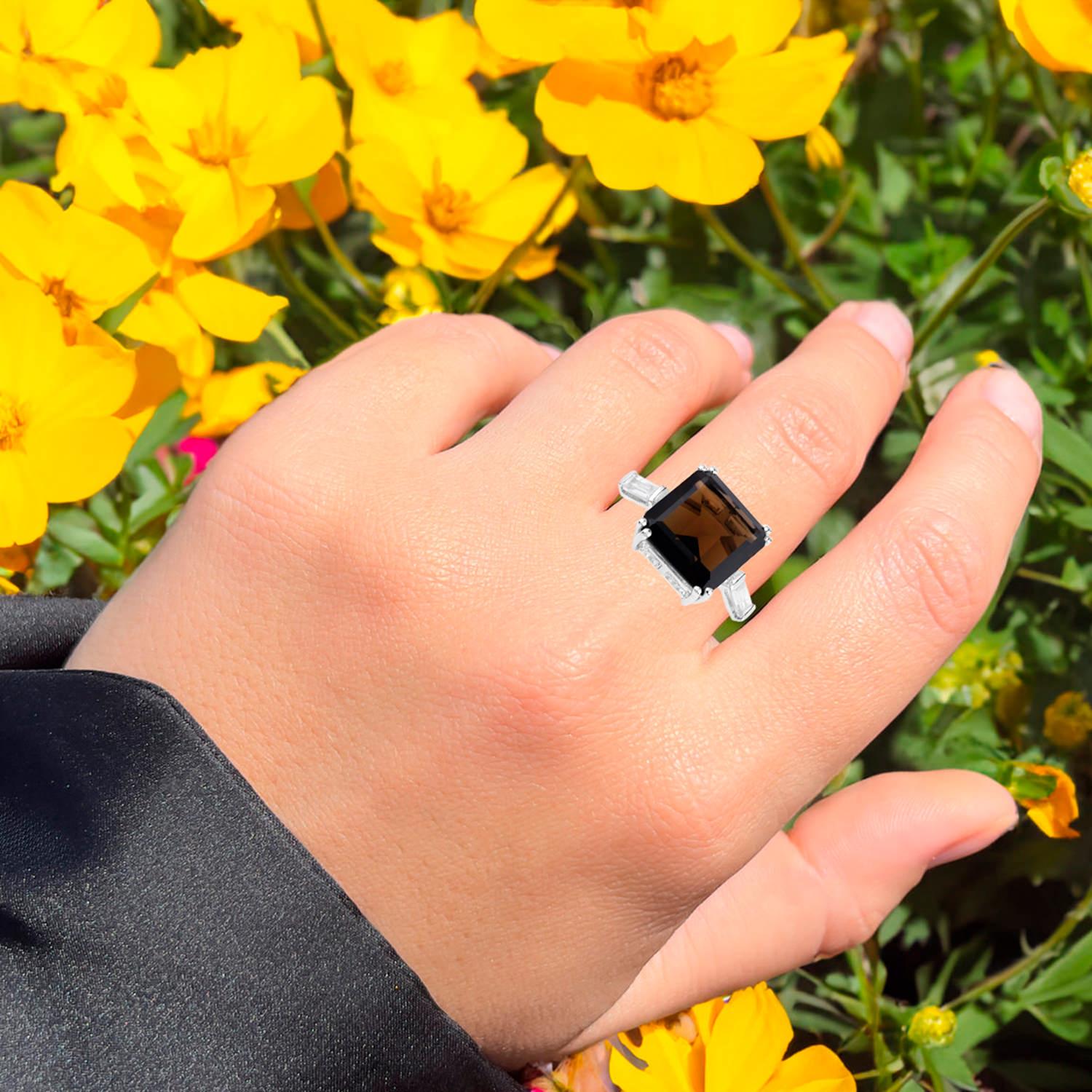 It comes with the Gemological Appraisal by GIA GG/AJP
All gemstones are natural
Smoky Quartz = 8.20 Carats
2 White Topaz = 0.58 Carats
Metal: Rhodium Plated Sterling Silver
Ring Size: 7* US
*It can be resized complimentary
