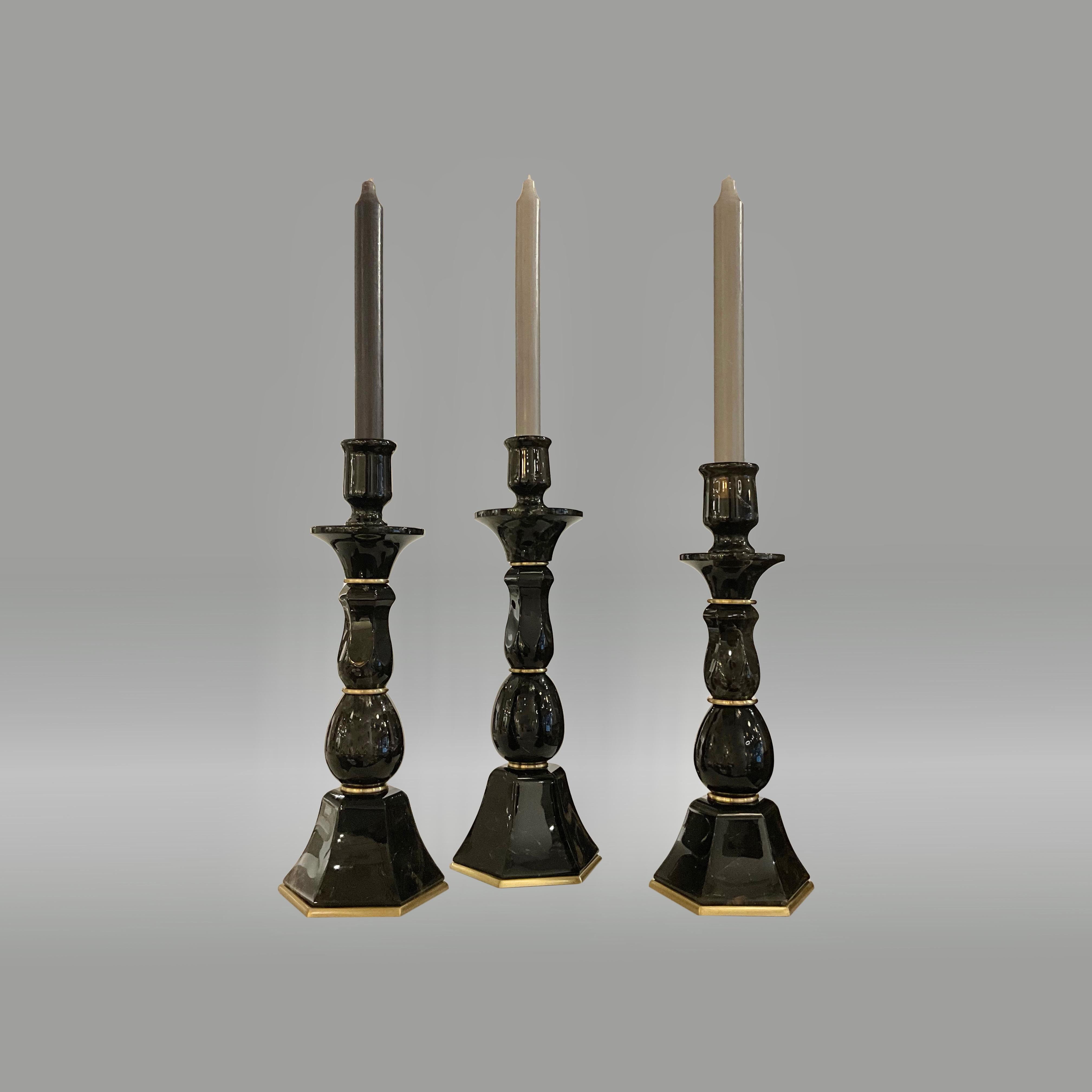 Group of three finely carved smoky rock candle holders.

Created by Phoenix 

