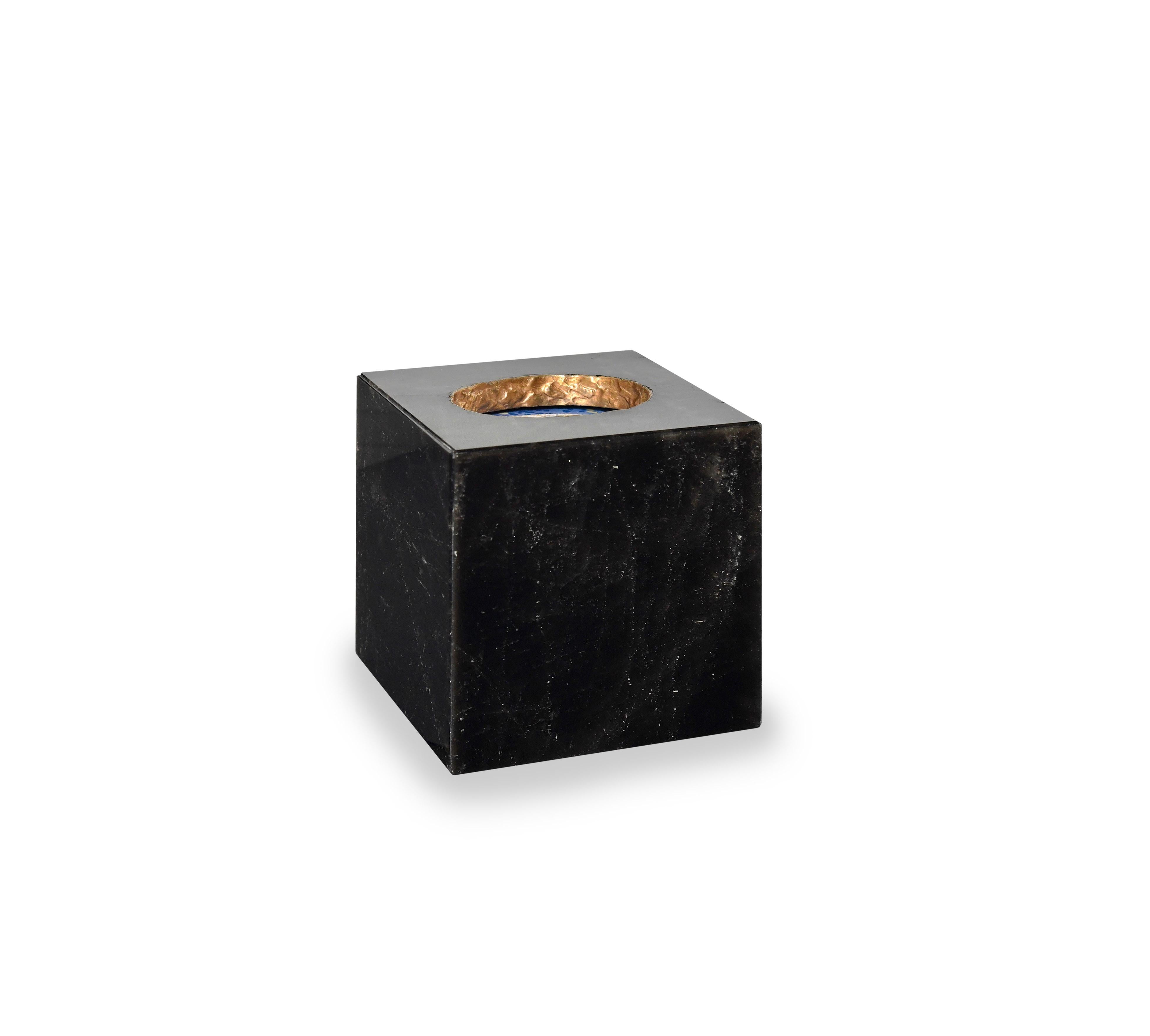 Smoky rock crystal tissue box with brass metal decoration on the top rim. Created by Phoenix Gallery, NYC.