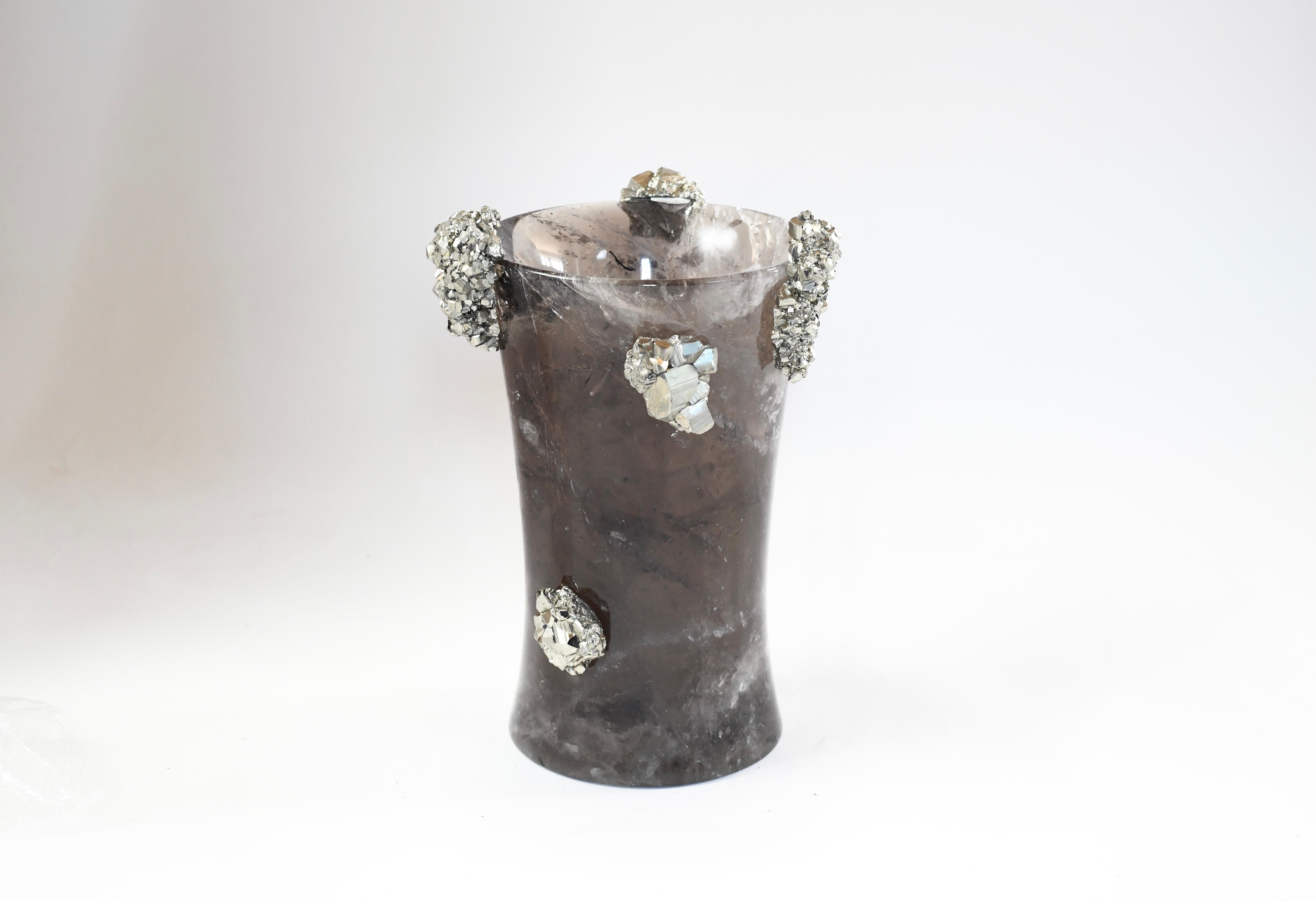 Finely carved smoky rock crystal vase with gem stones decoration.
Created by Phoenix.