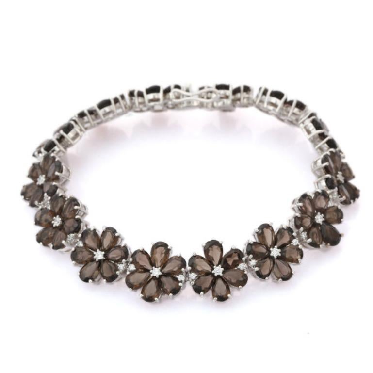 Beautifully handcrafted silver Smoky Topaz Flower Charm Bracelet for Engagement, designed with love, including handpicked luxury gemstones for each designer piece. Grab the spotlight with this exquisitely crafted piece. Inlaid with natural smoky