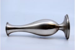 Smooth and raised silver jug