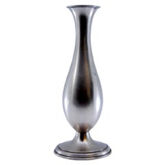 Smooth and raised silver jug