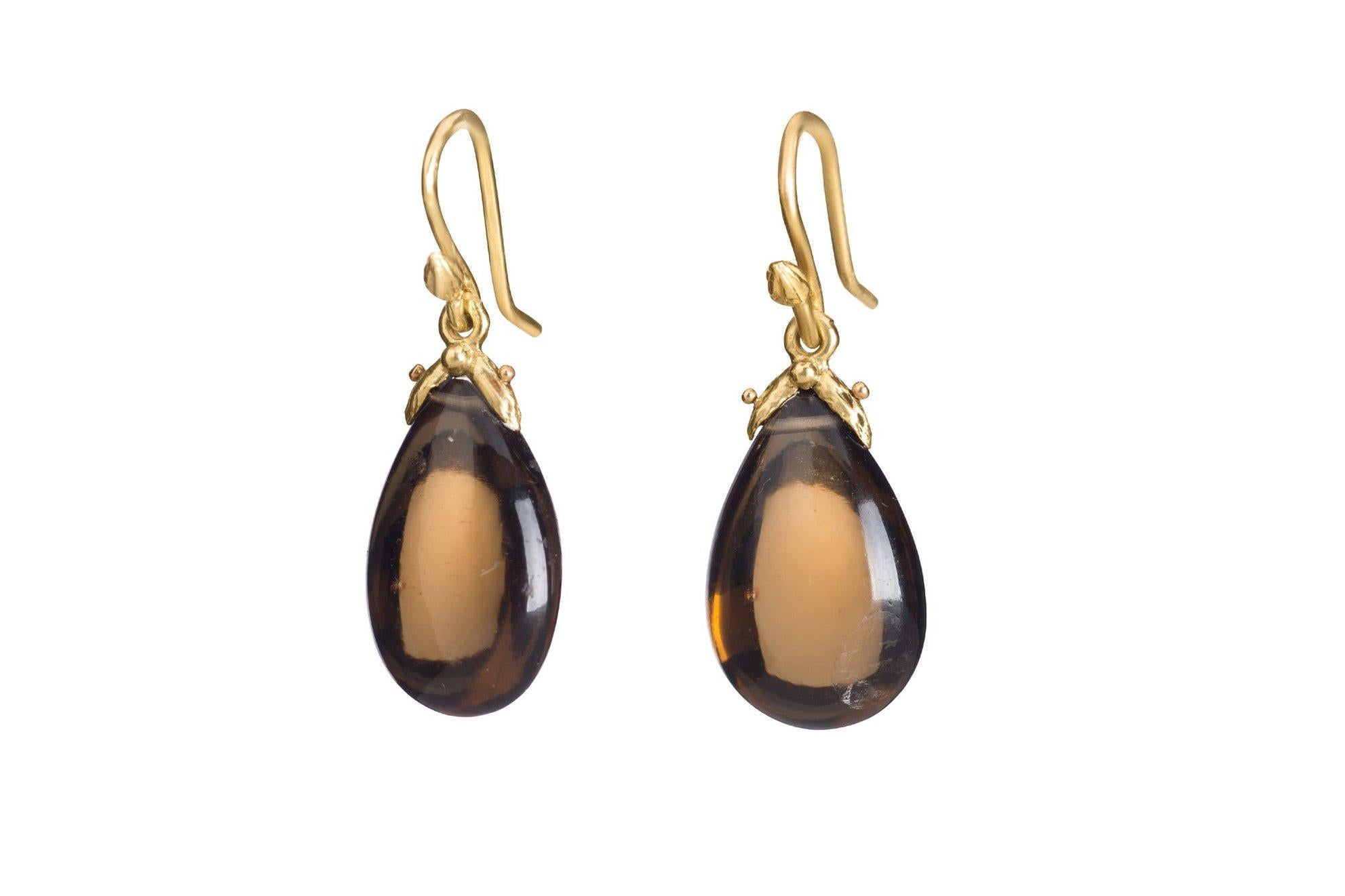 Smoky cognac smooth drops make a perfect earring for everyday wear. these capture the daylight and candlelight.