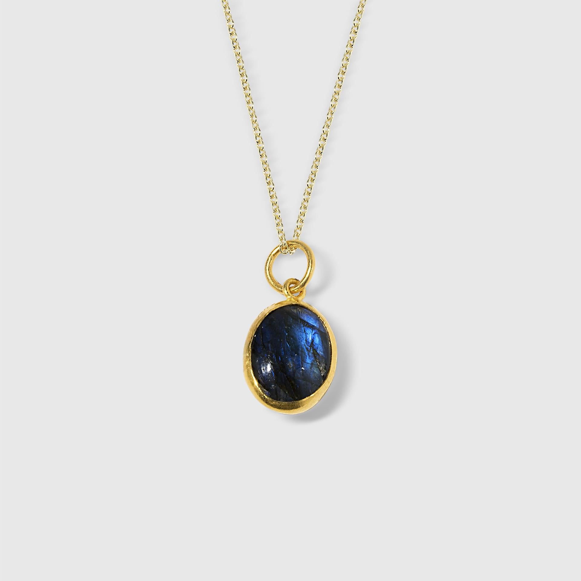 Smooth, Oval 5.45ct Labradorite Charm Pendant Necklace, 24kt Solid Gold by Prehistoric Works of Istanbul, Turkey. These pendants pair well alone or with other coin pendants or with miniature pendants. Great piece for layering or on its own. Comes