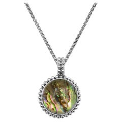 Pendentif en argent sterling en cristal de roche lisse, orné d'abalone et de plaques d'or