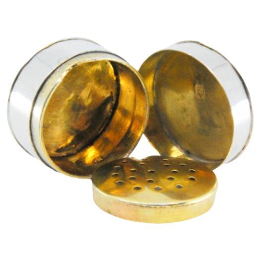 Smooth round silver and gold vinaigrette box from the George III period