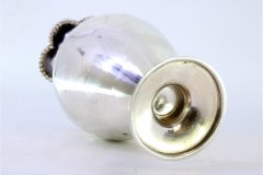 Smooth, rounded silver jug