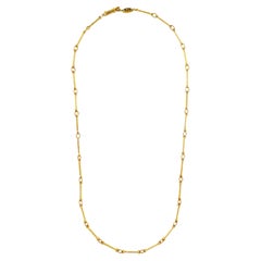 Smooth segmented 18 K gold necklace