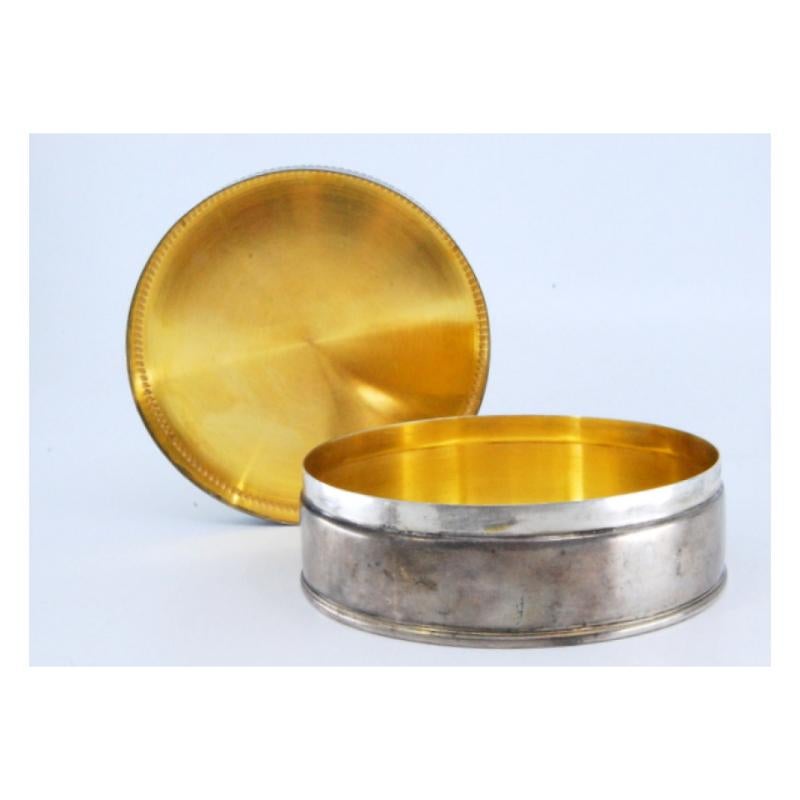 20th Century Smooth silver box w/ a circular shape & pearly edges, w/ a lady & boy on the lid For Sale