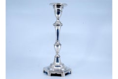 Smooth silver candlestick with turned shaft on hexagonal base